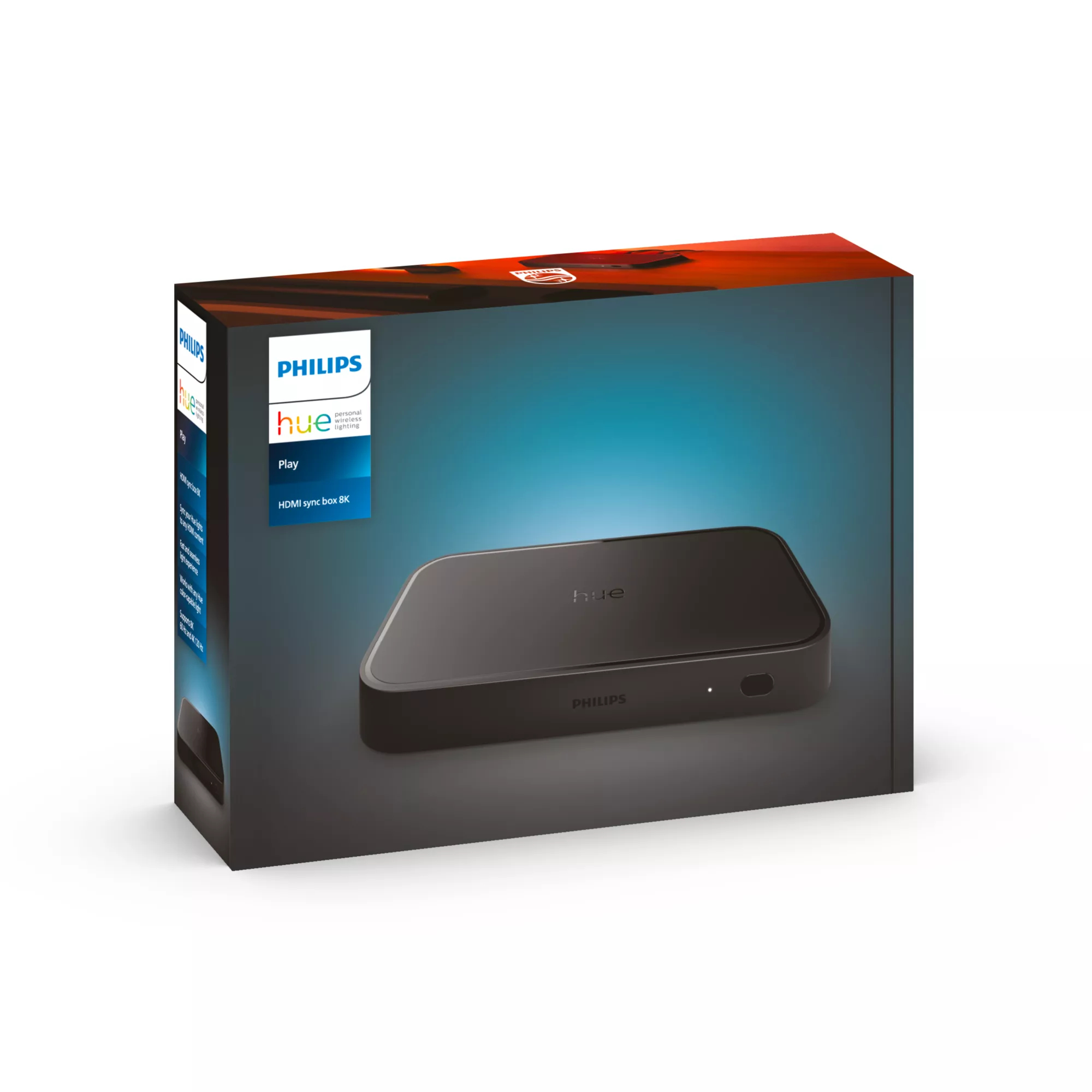 Una caja de sincronización HDMI Philips Hue Play. La caja es negra y tiene el logotipo de Philips Hue. El embalaje es visible.