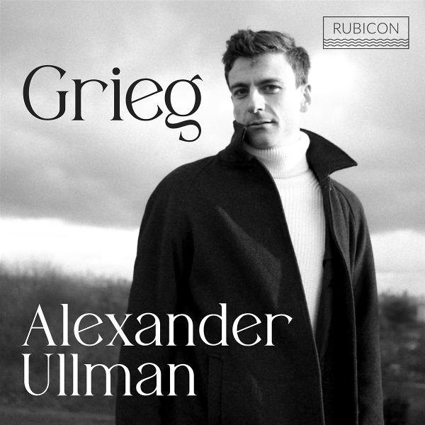 Schwarz-Weiß-Porträt eines Mannes mit Mantel und Rollkragen. Text: 'Grieg' und 'Alexander Ullman'. Rubicon-Logo oben rechts.