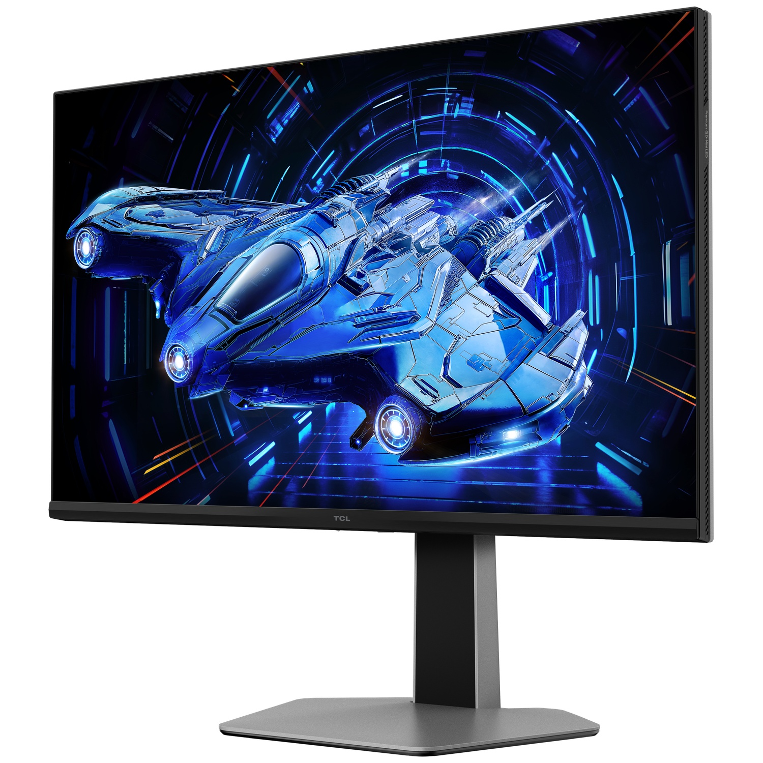 Un moniteur TCL affiche un graphique de vaisseau spatial bleu. Le moniteur a un cadre noir et une base argentée. Le fond est bleu foncé.