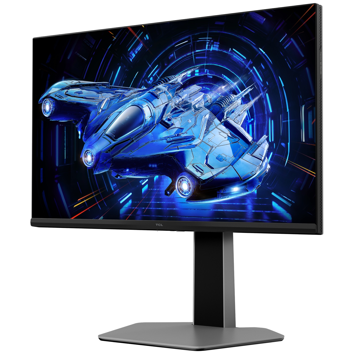 L'écran TCL affiche un vaisseau spatial bleu. Le moniteur a un cadre noir, un support gris et une base grise. Fond blanc.