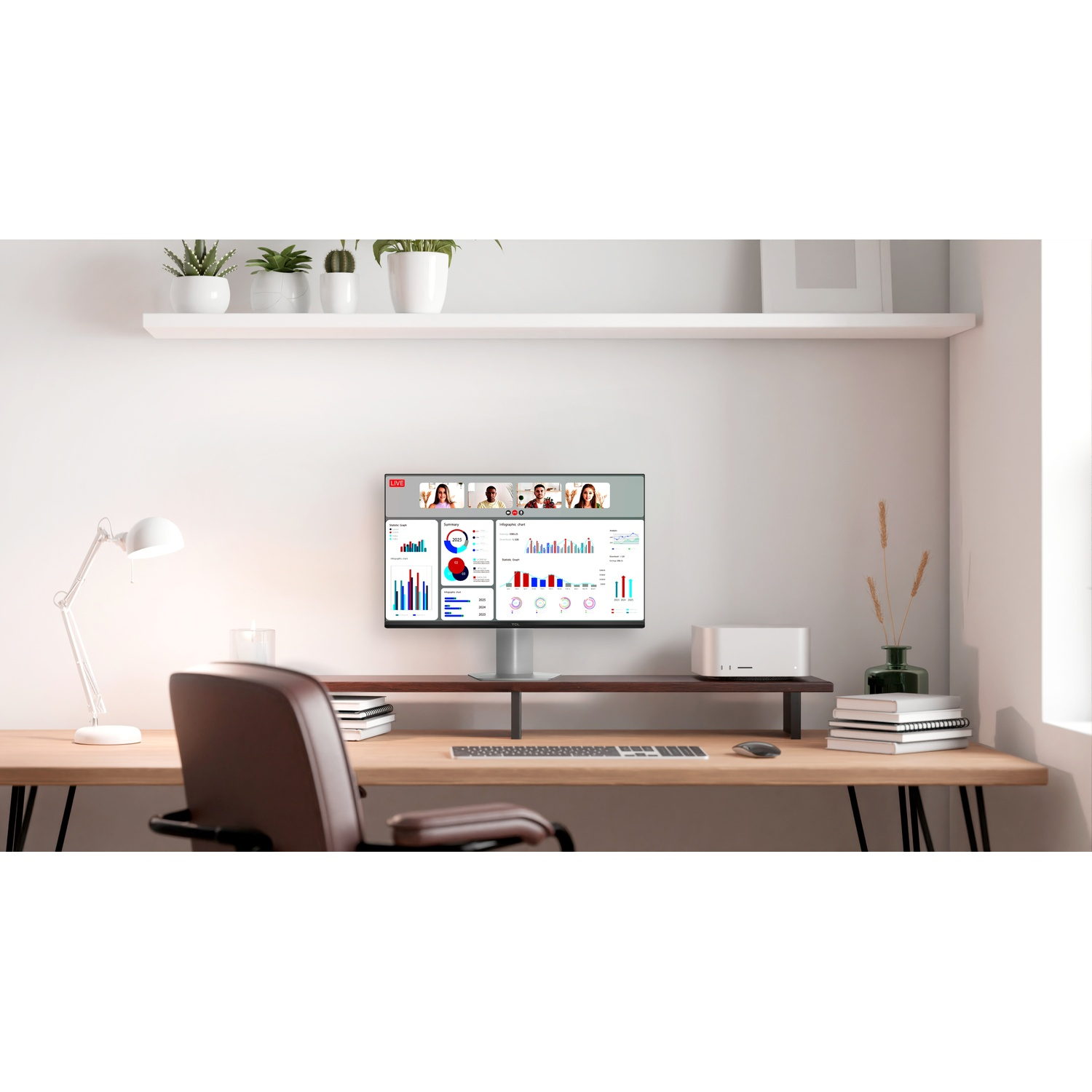 A modern office setup with a monitor displaying data and video call, desk, chair, plants, and a white lamp.