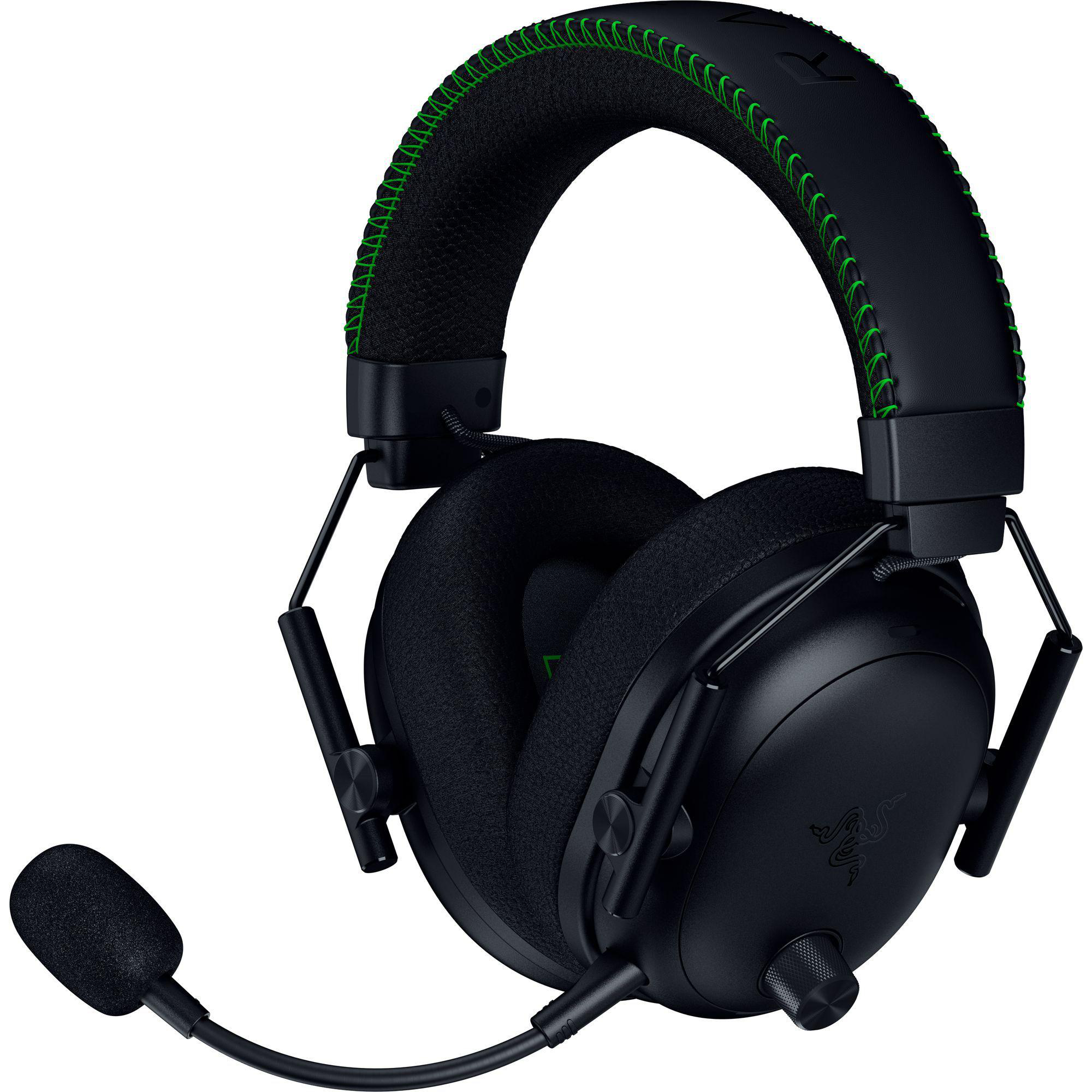 Schwarzes Gaming-Headset mit Mikrofon. Grüne Nähte am Kopfband. Razer-Logo auf der Ohrmuschel.