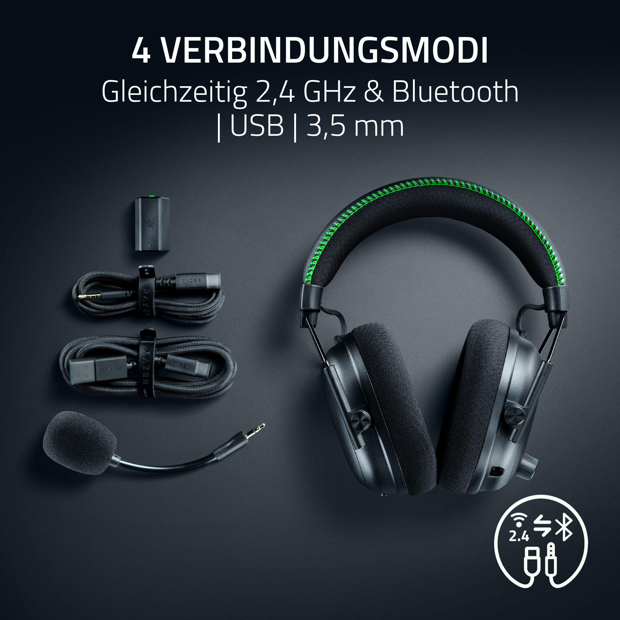 Schwarzes Headset mit grünen Akzenten, Kabeln, Mikrofon und drahtlosem Empfänger auf dunklem Hintergrund.