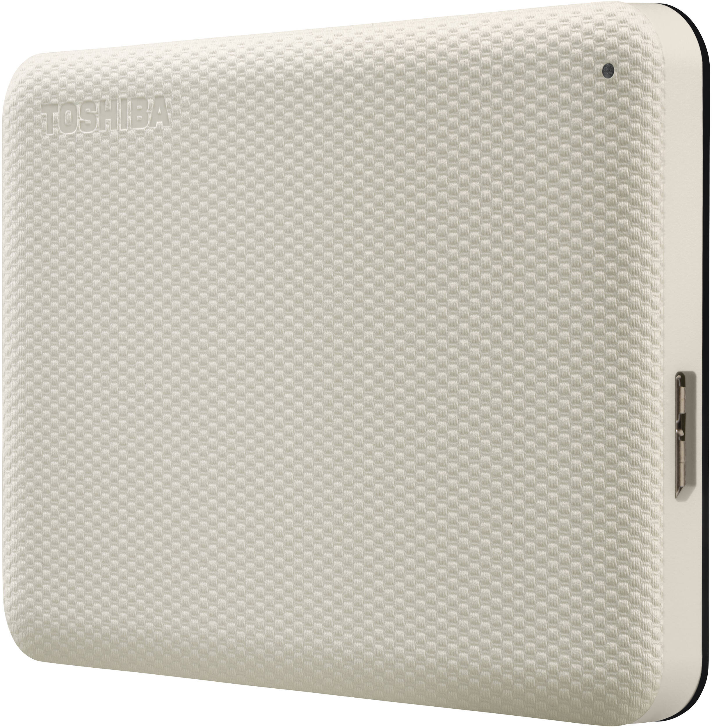 Disque dur externe Toshiba de couleur crème. Il a une surface texturée avec le logo Toshiba et un port USB.