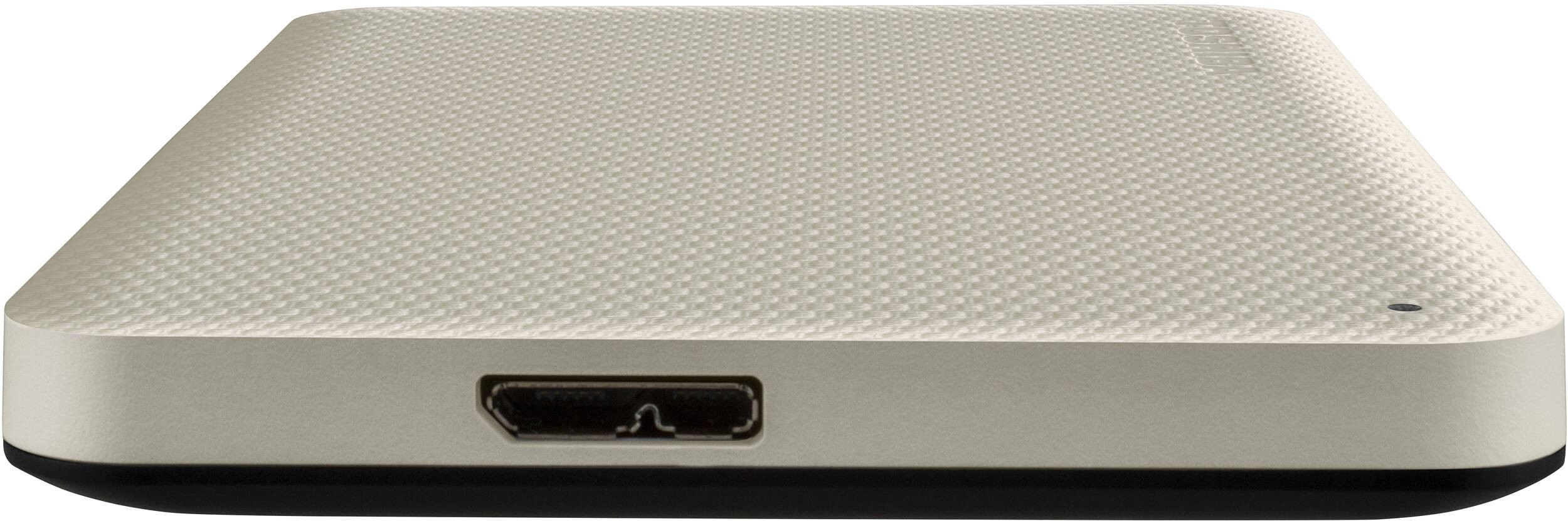 Un disque dur externe beige Toshiba, avec un dessus texturé et une base noire, doté d'un port HDMI.