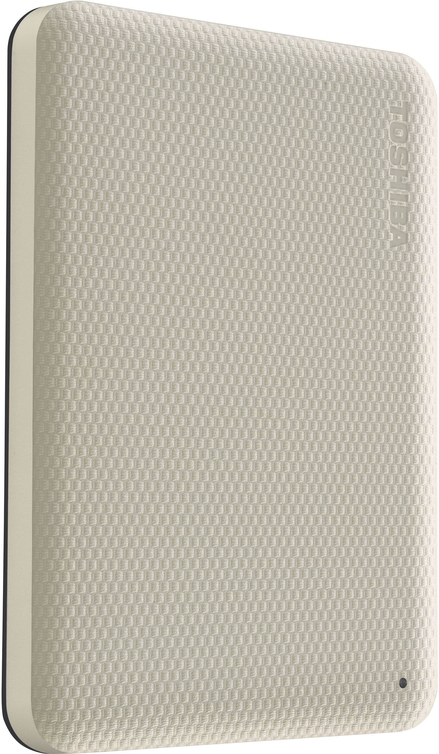 Un disque dur externe beige Toshiba. Il a une surface texturée avec le nom de la marque. Un petit point noir sur le coin.