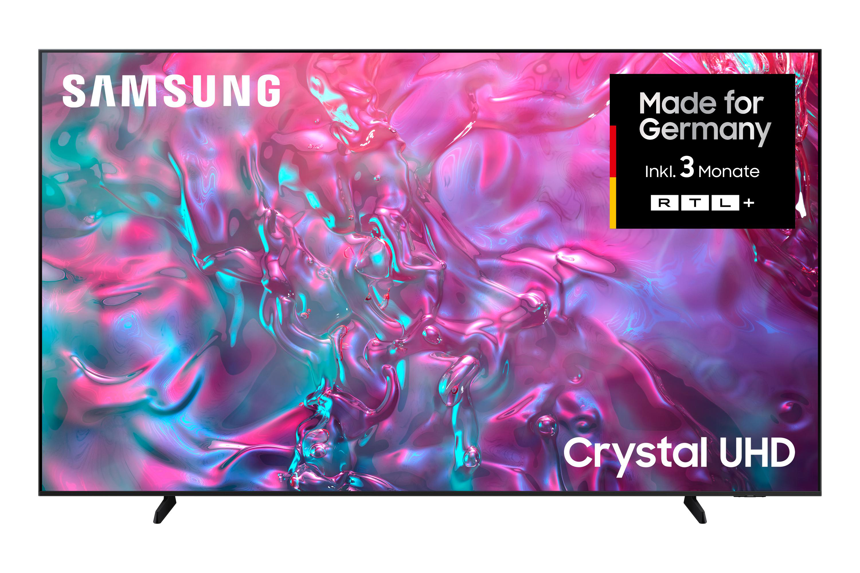 Samsung Crystal UHD TV. Hergestellt für Deutschland. Rosa, blauer und weißer Hintergrund. Schwarzer Ständer.