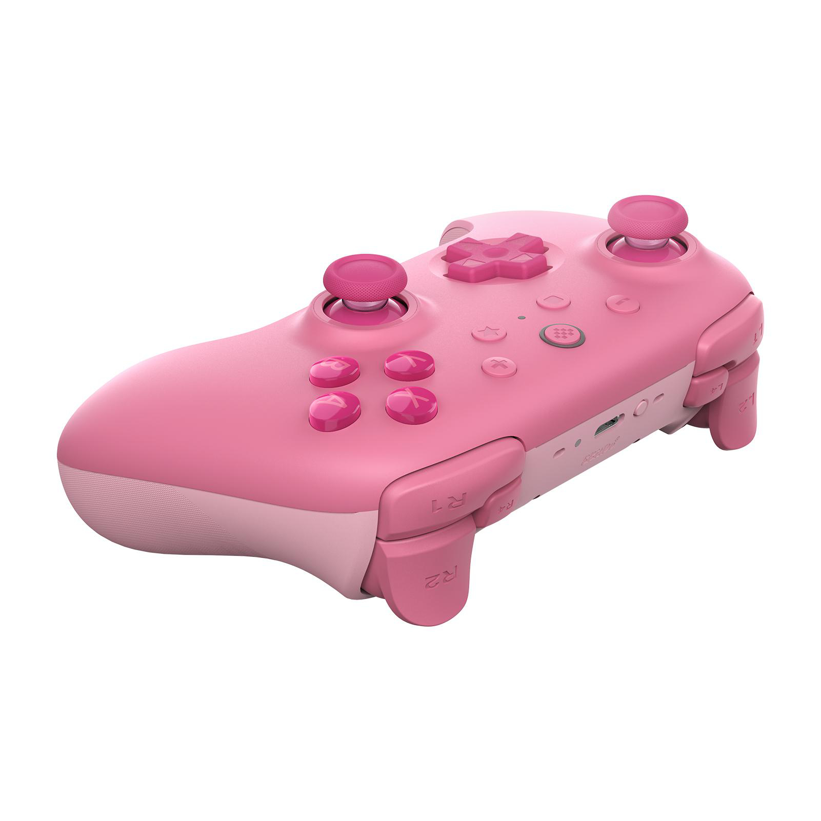 Ein rosa Gamecontroller wird gezeigt. Er hat verschiedene Knöpfe und Joysticks. Der Hintergrund ist weiß.