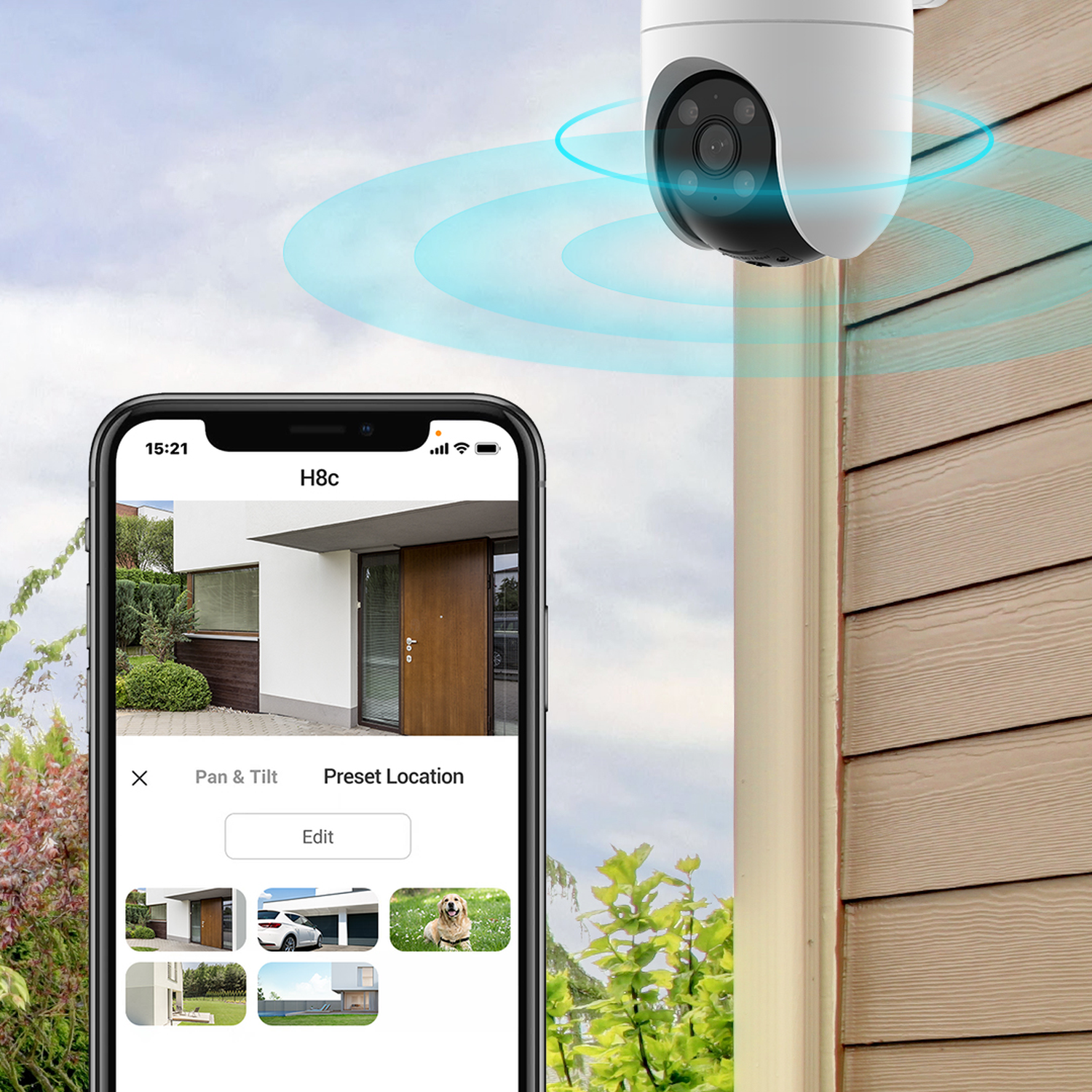 Een beveiligingscamera en een telefoon die de live camerabeelden weergeeft. De telefoon toont een huis, een auto en een hond op het scherm.