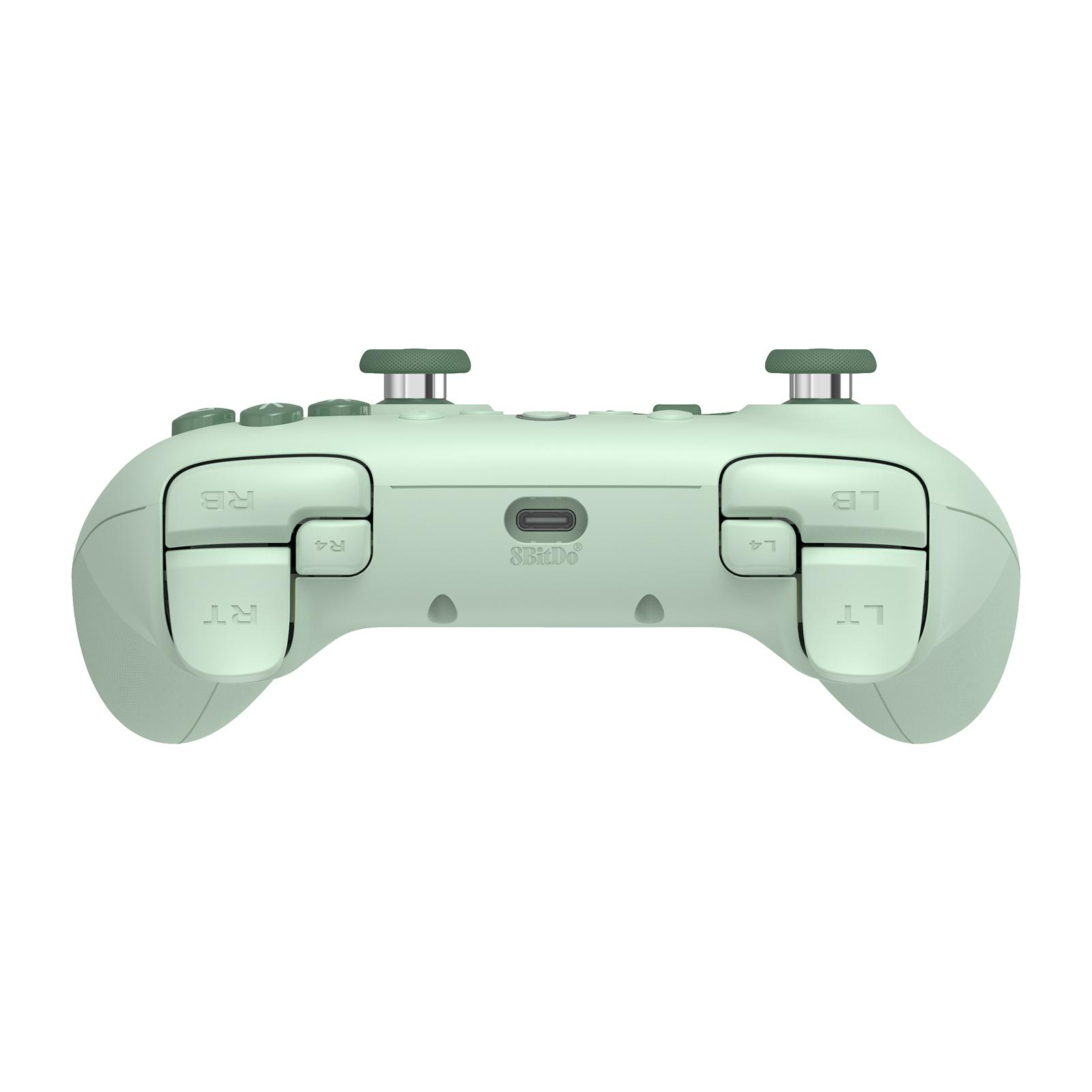 Ein mintgrünes Gamepad mit Knöpfen und Joysticks. Der Markenname ist 8BitDo.