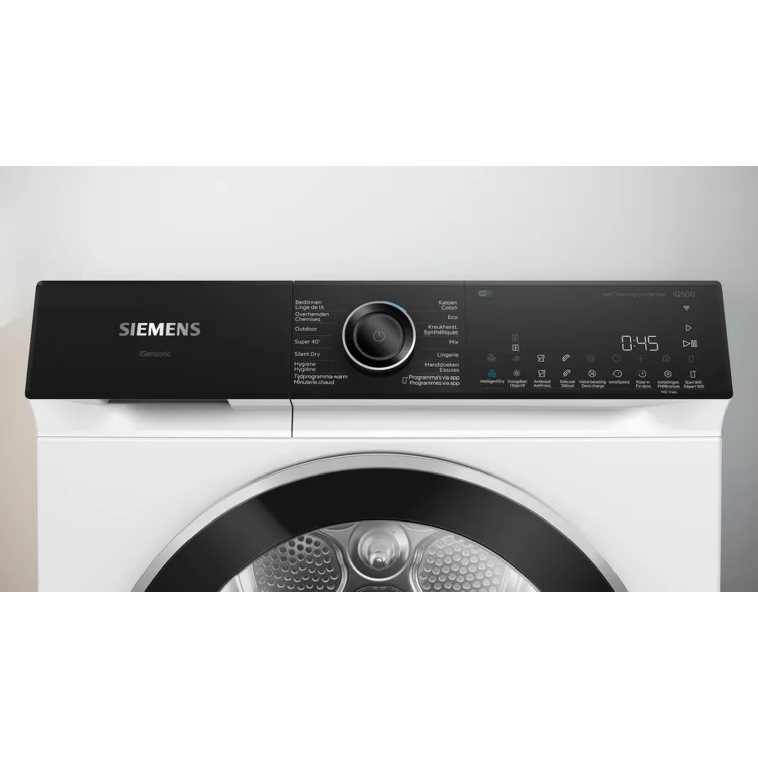 A white Siemens dryer with a black control panel displays settings and a timer, with a round door.