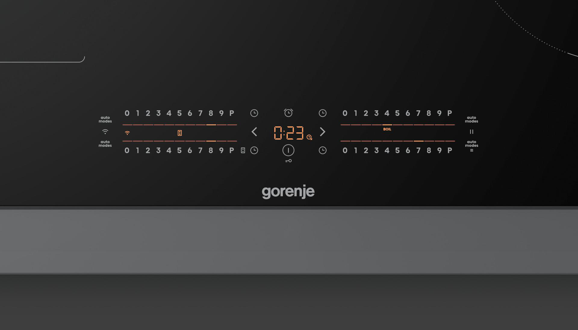 Schwarzes Induktionskochfeld mit Digitalanzeige. Zahlen, Symbole und die Marke 'gorenje' sind sichtbar.
