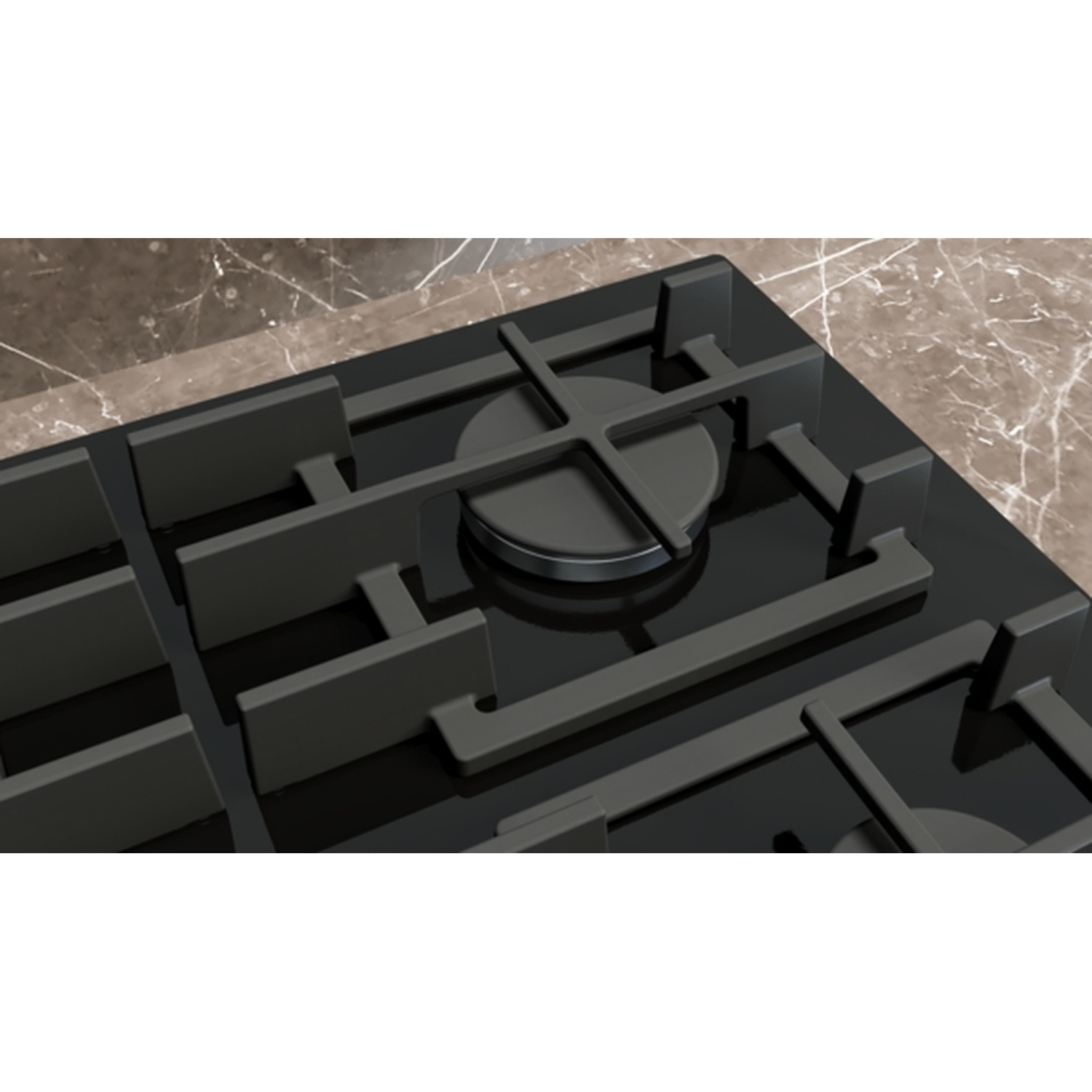 Gros plan sur une table de cuisson noire avec des grilles métalliques. Plan de travail en marbre en arrière-plan.