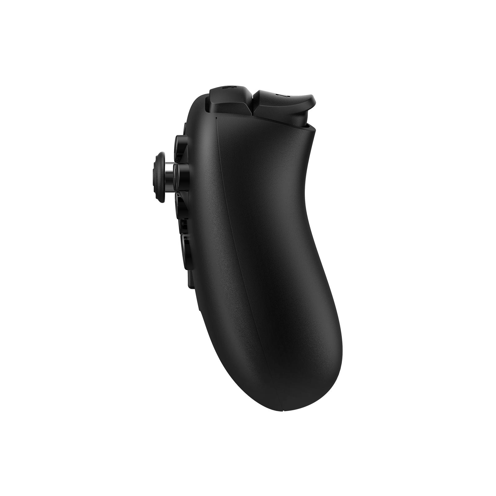 Seitenansicht eines schwarzen Gamecontrollers. Knöpfe und Analogstick sind sichtbar. Der Hintergrund ist weiß.