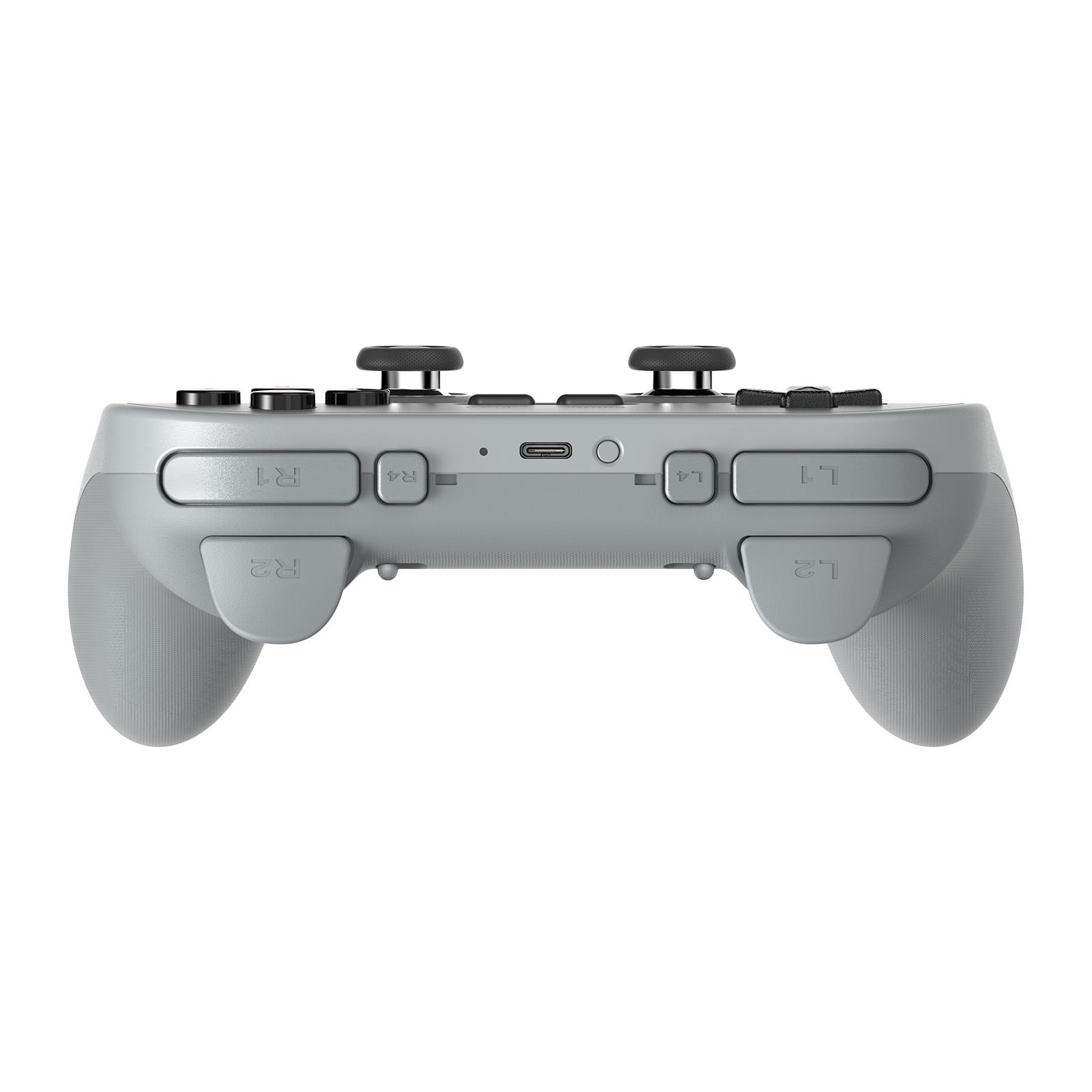 Ein hellgrauer Gamecontroller. Er hat Knöpfe, Analog-Sticks und Auslöser. Das Design ist symmetrisch und modern.
