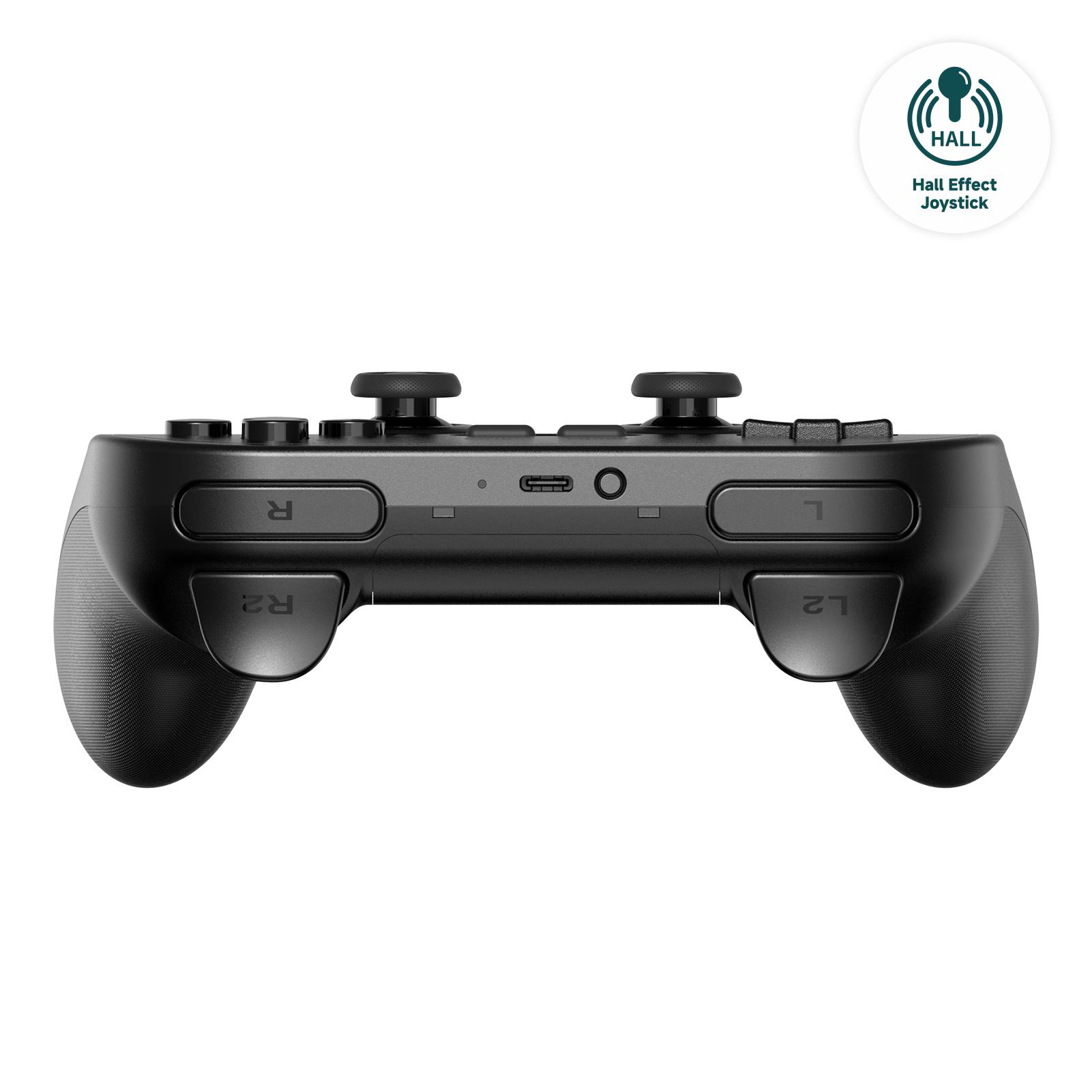Schwarzer Gamecontroller mit Knöpfen, Triggern und Hall-Effect-Joystick-Logo in der Ecke auf weißem Hintergrund.