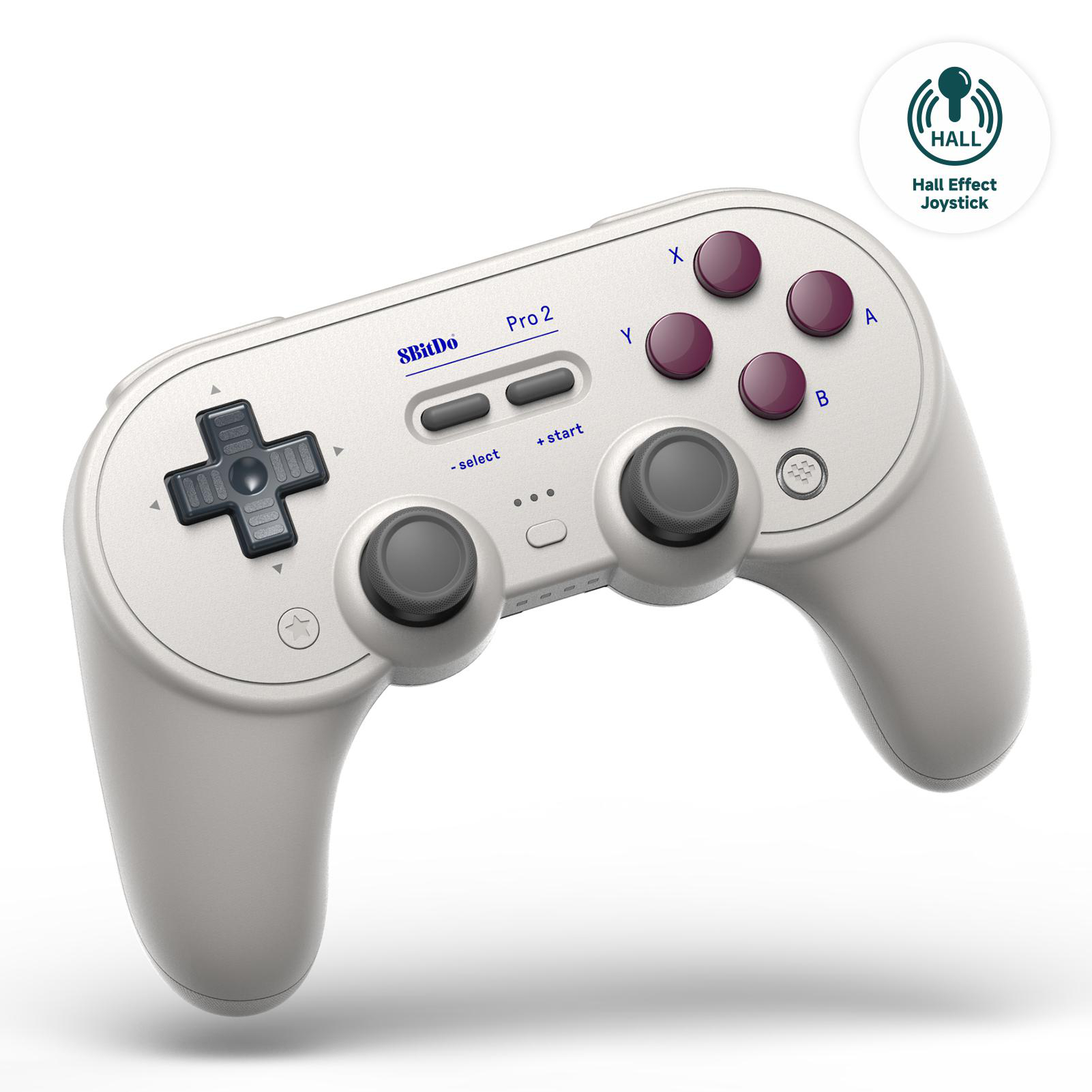 Ein weißer 8BitDo Pro 2 Controller. Er hat lila und graue Knöpfe. Rechts ist das Logo "Hall Effect Joystick".