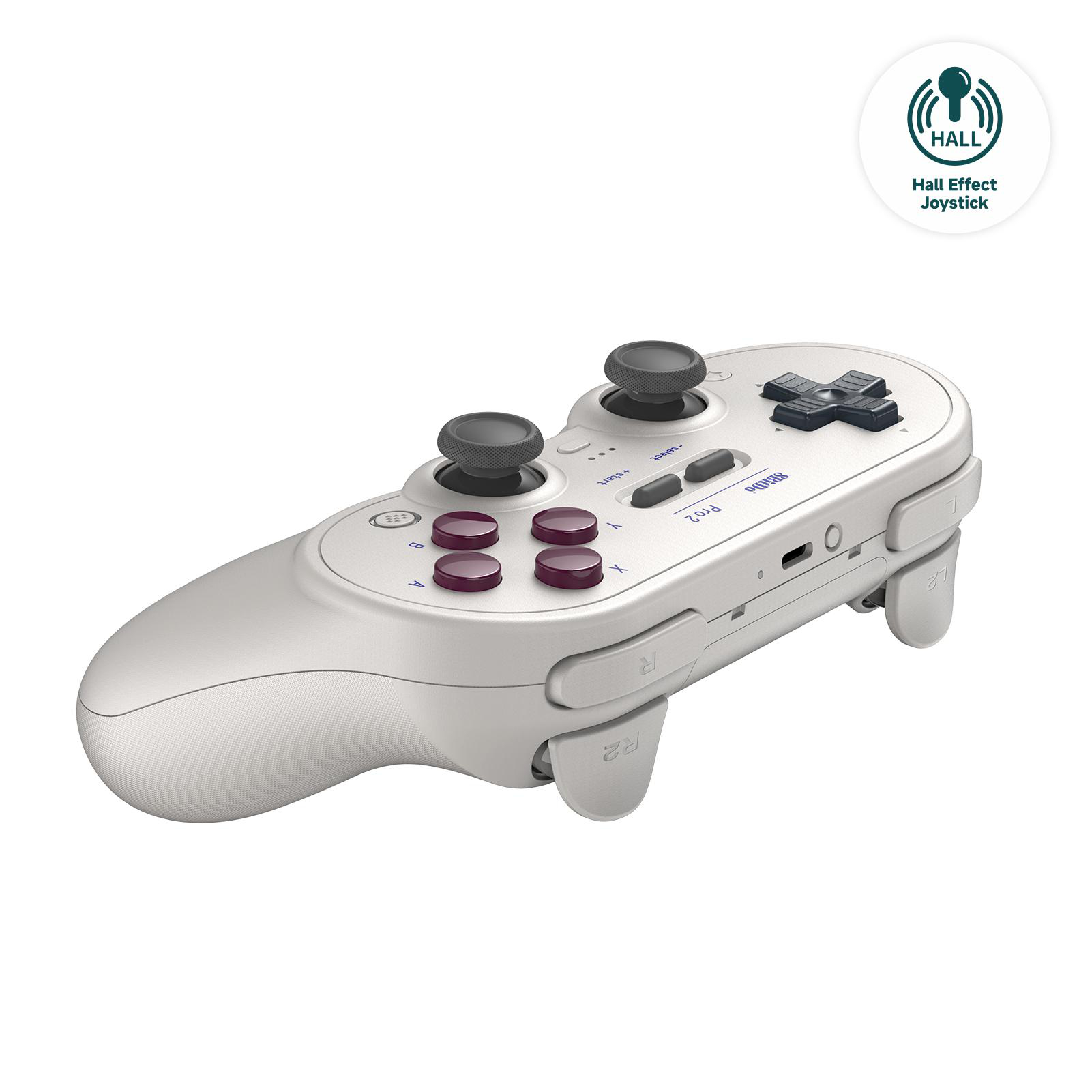 Ein weiß-grauer Gamecontroller mit Knöpfen, Joysticks und einem Logo. Es hat ein Hall-Effekt-Joystick-Abzeichen.