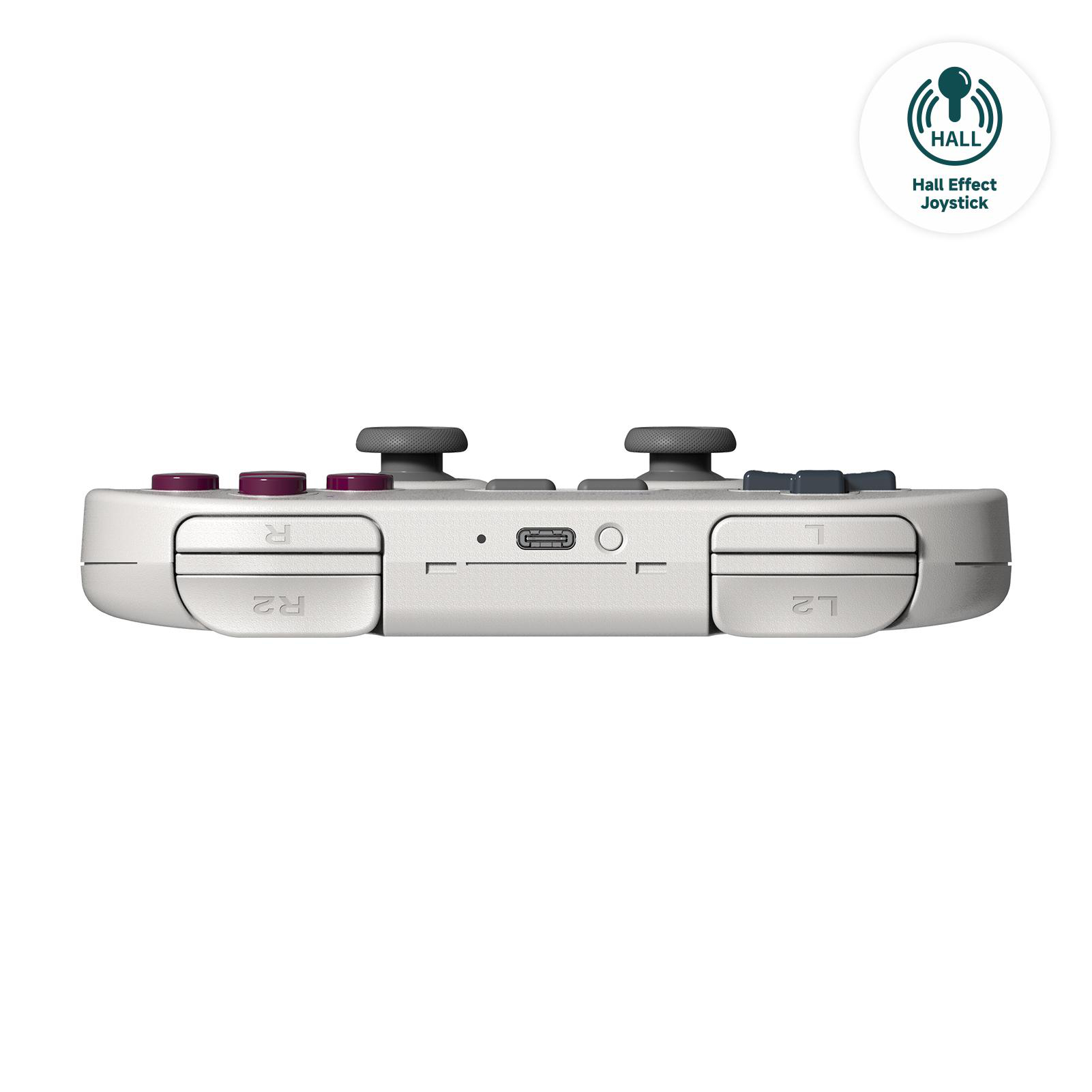 Ein weißer Gamecontroller mit grauen Joysticks und lila Knöpfen. Oben rechts befindet sich ein Hall Effect Joystick Logo.