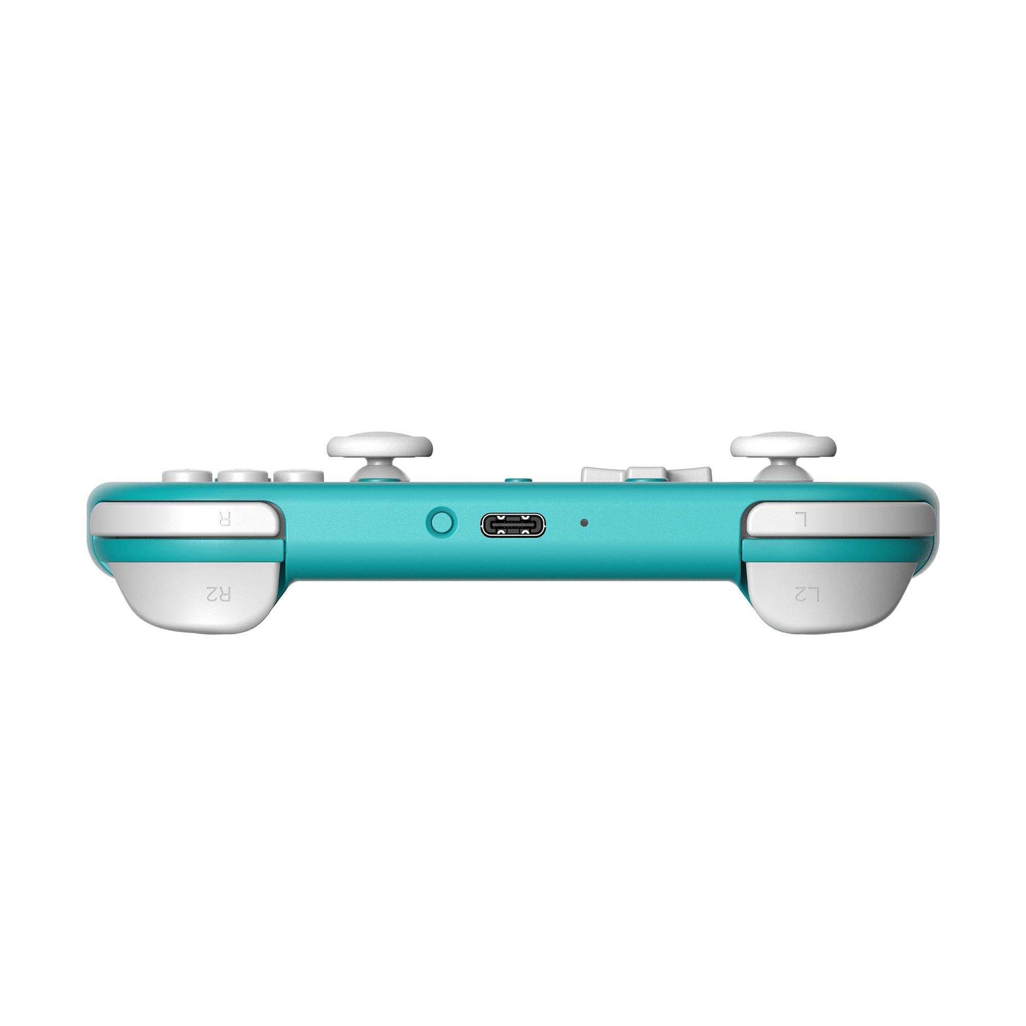 Seitenansicht eines türkisblauen Gamecontrollers mit weißen Tasten. Er hat L-, R-, L2- und R2-Tasten. USB-Anschluss sichtbar.