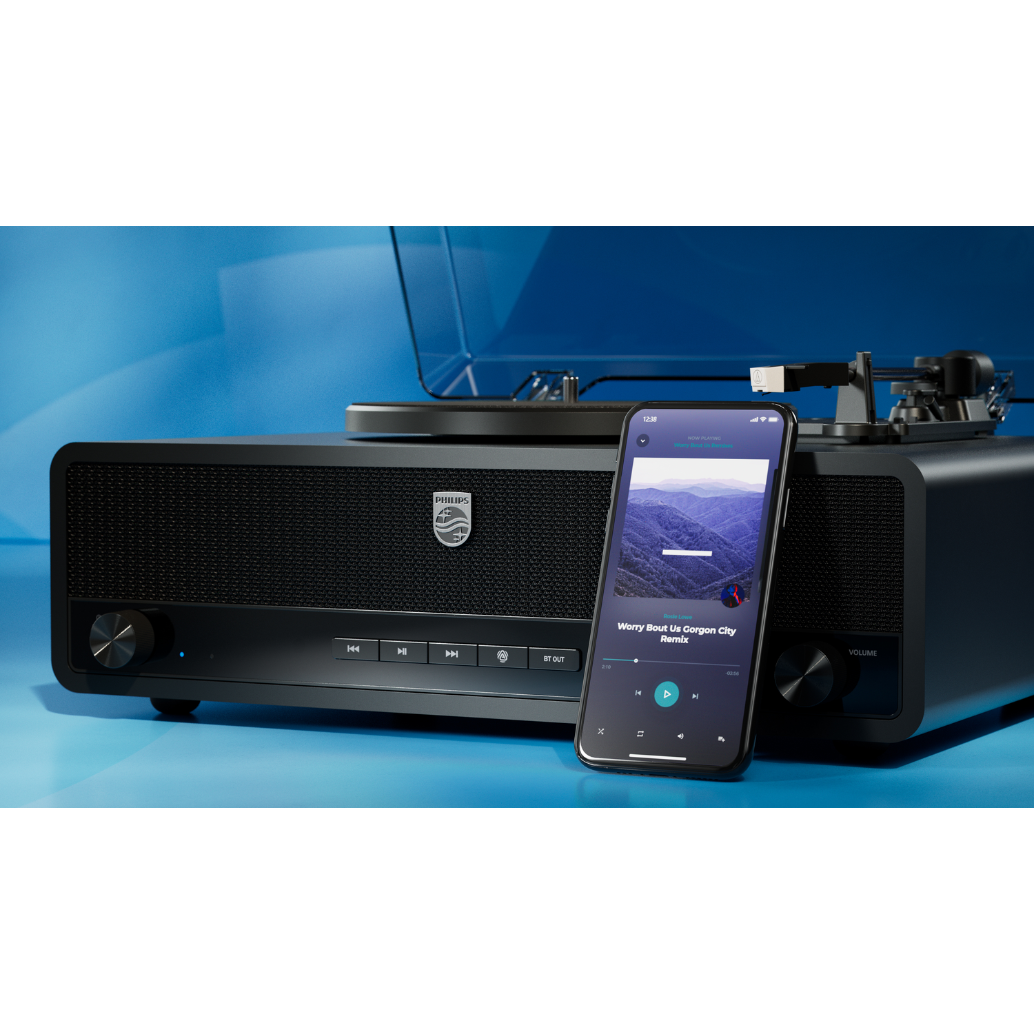 Black audio system with turntable and smartphone displaying a song. Blue background. Philips logo is visible.