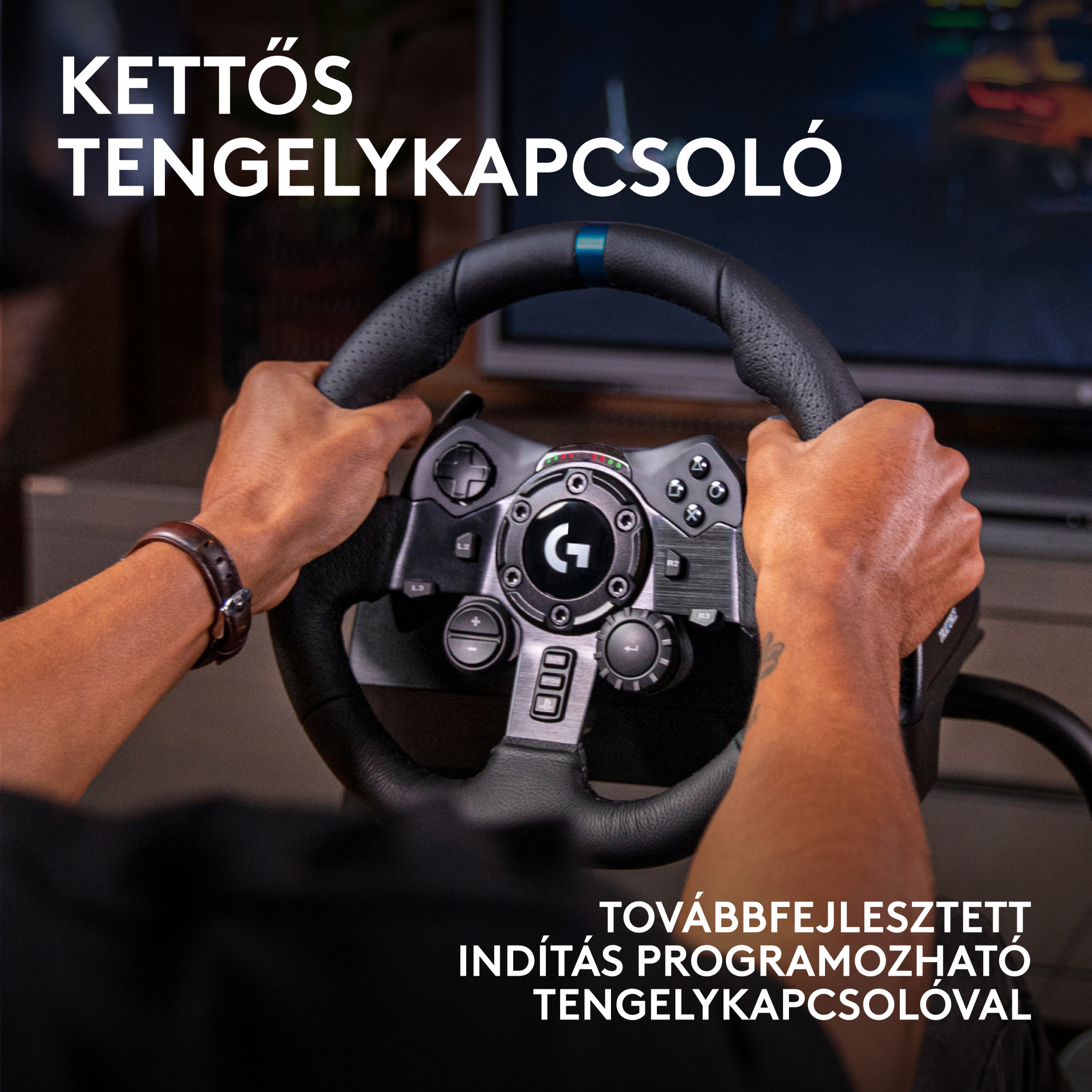 Kézben egy fekete kormány. A szöveg azt mondja: 'Kettős tengelykapcsoló' és 'Továbbfejlesztett programozható tengelykapcsoló'.
