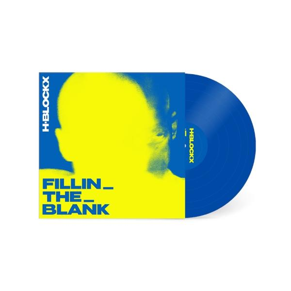 Albumcover: Gelbes Gesicht auf blauem Cover, Titel 'Fillin_ The_ Blank', blaue Vinyl-Schallplatte guckt heraus.