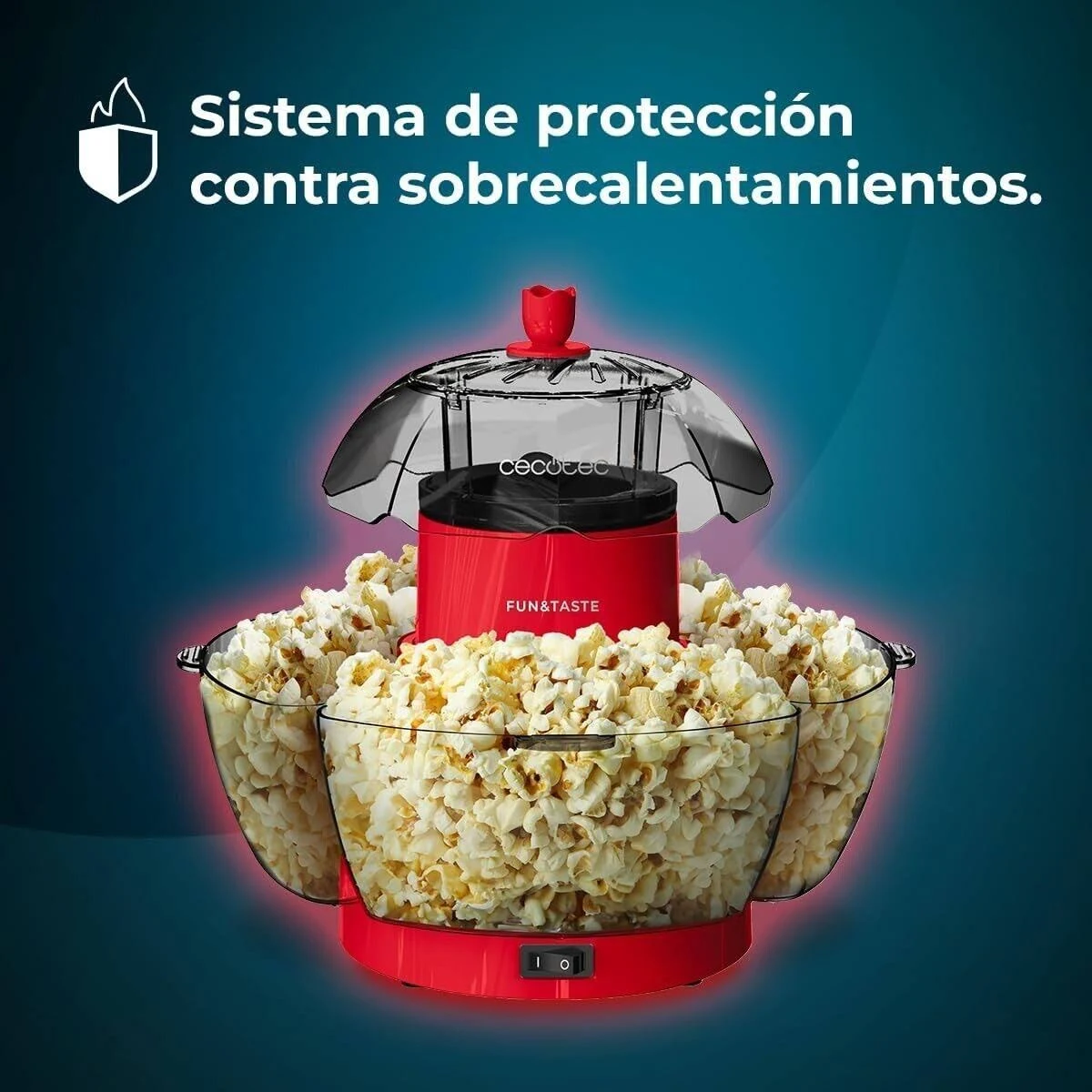 Máquina de palomitas roja con palomitas en cuencos. La máquina dice Fun&Taste. El texto superior dice 'Sistema de protección contra sobrecalentamientos'.