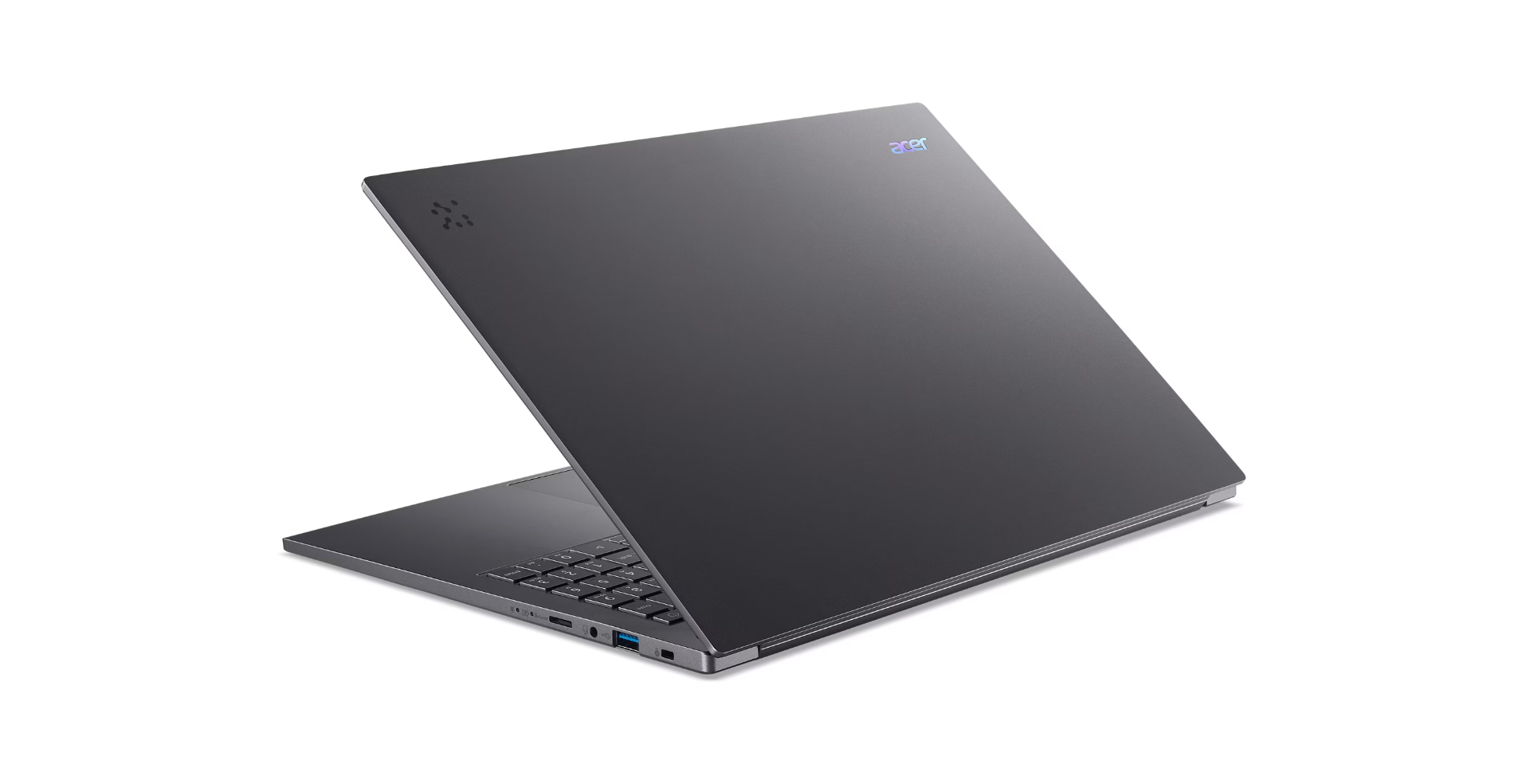 A gray Acer laptop. The lid is open. The keyboard and ports are visible. The background is white.