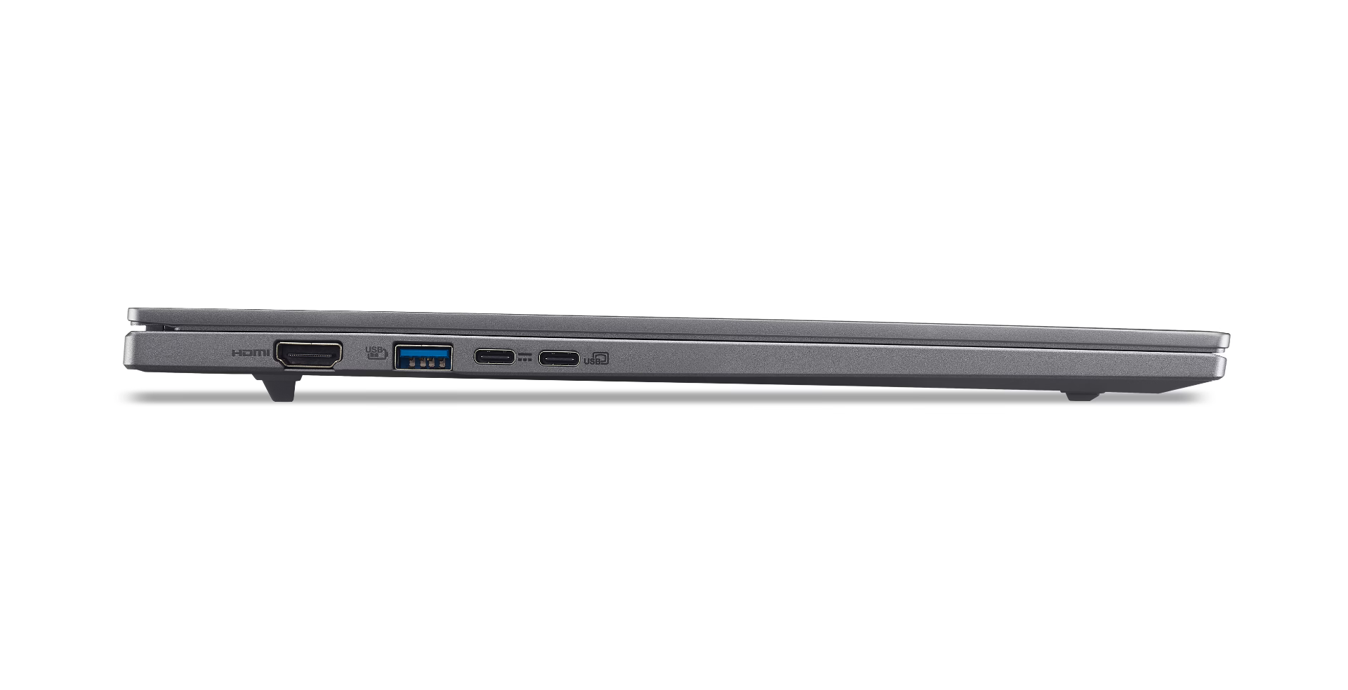 Side view of a gray laptop. Ports include HDMI, USB, and charging. The laptop is on a white surface with a black background.