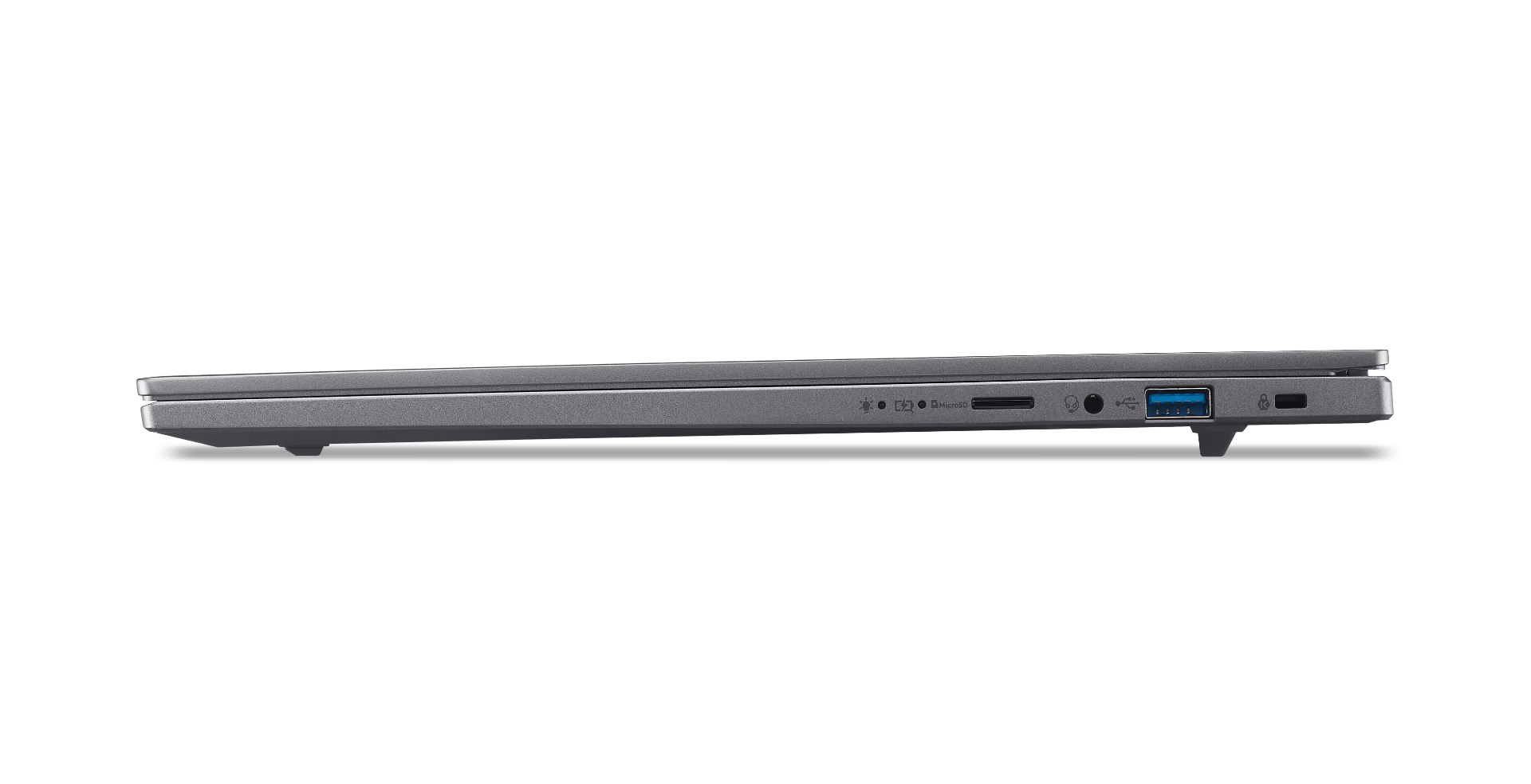 Side view of a gray laptop. Visible ports include USB, audio jack, and SD card slot. The laptop is slightly open.