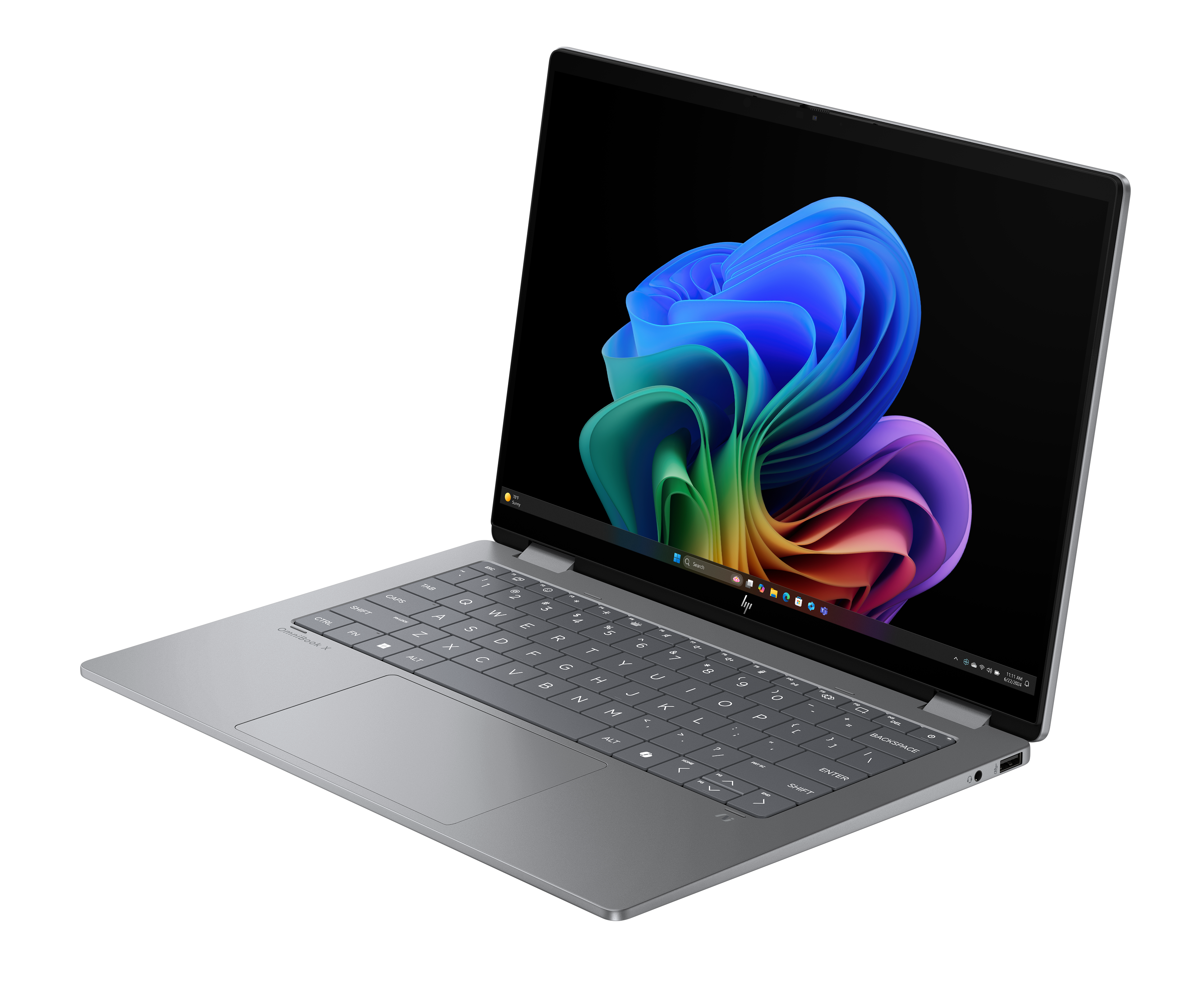 Ein grauer Laptop ist geöffnet, mit einem farbenfrohen abstrakten Bild auf dem Bildschirm, vor schwarzem Hintergrund.