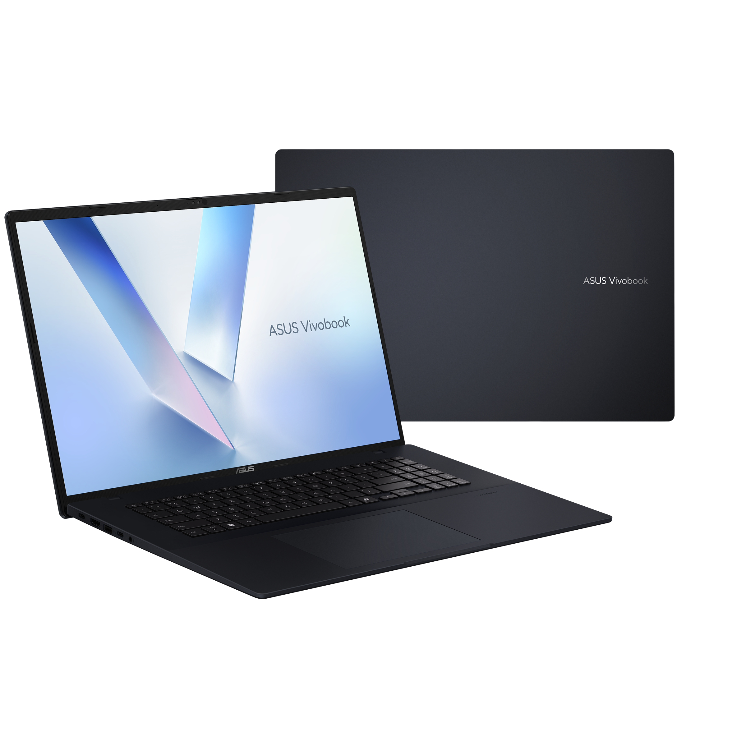 Ein dunkler Laptop ist geöffnet, der Bildschirm zeigt ein abstraktes Design, und die Rückseite eines anderen Laptops ist sichtbar.