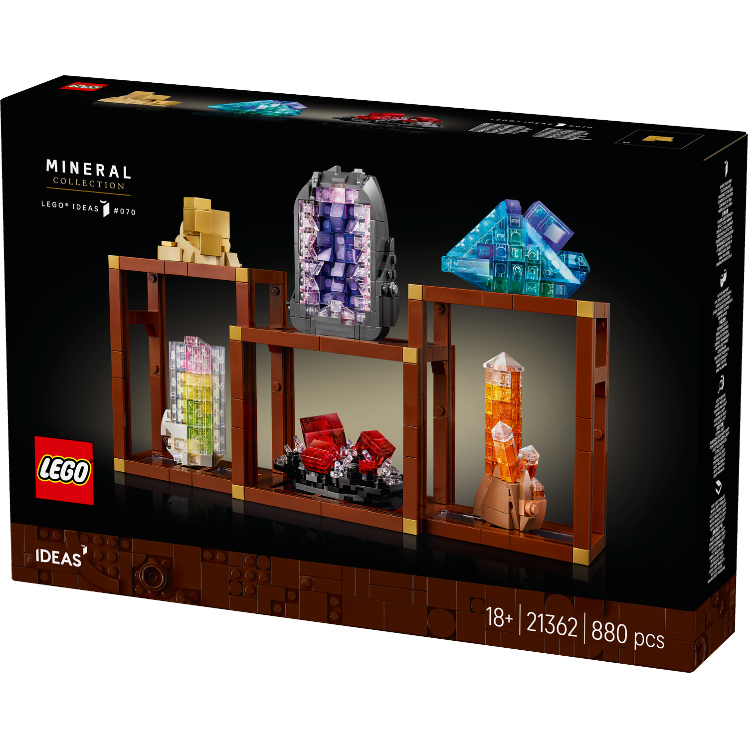 LEGO Ideas Mineral Collection box. Displays a shelf with Lego crystals: gold, purple, blue, clear, red, and orange. Black background.