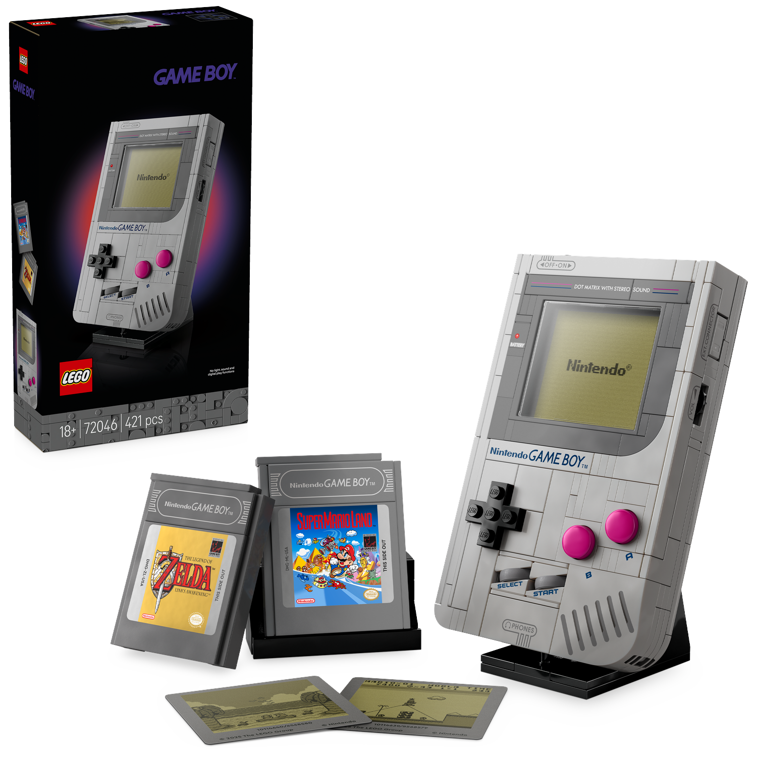 A Lego Game Boy set with cartridges and cards. The box shows the model. The Game Boy is gray, with pink buttons.