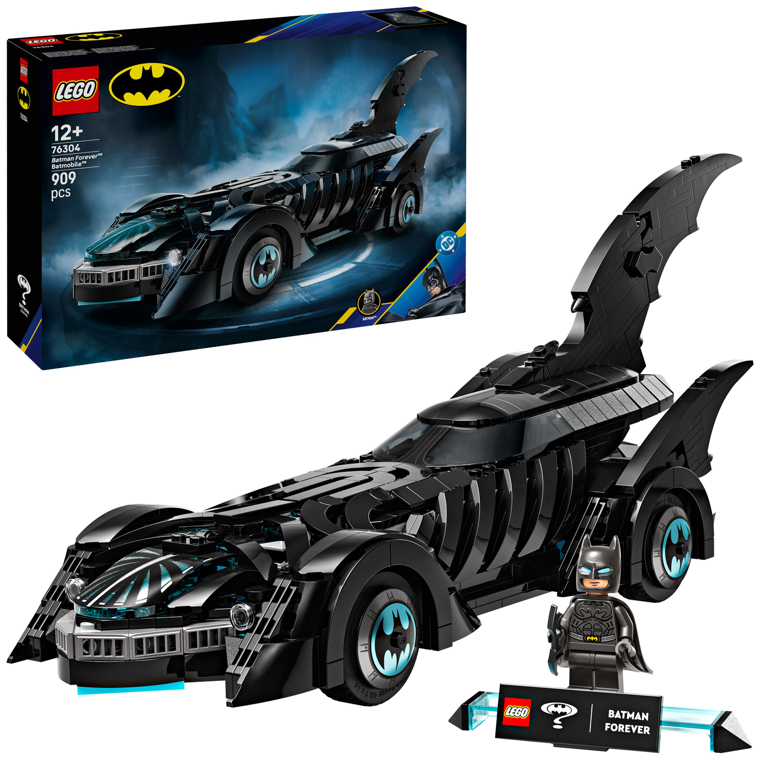 A Lego set of the Batman Forever Batmobile. The black car has large fins. A Batman figure and the box are also present.