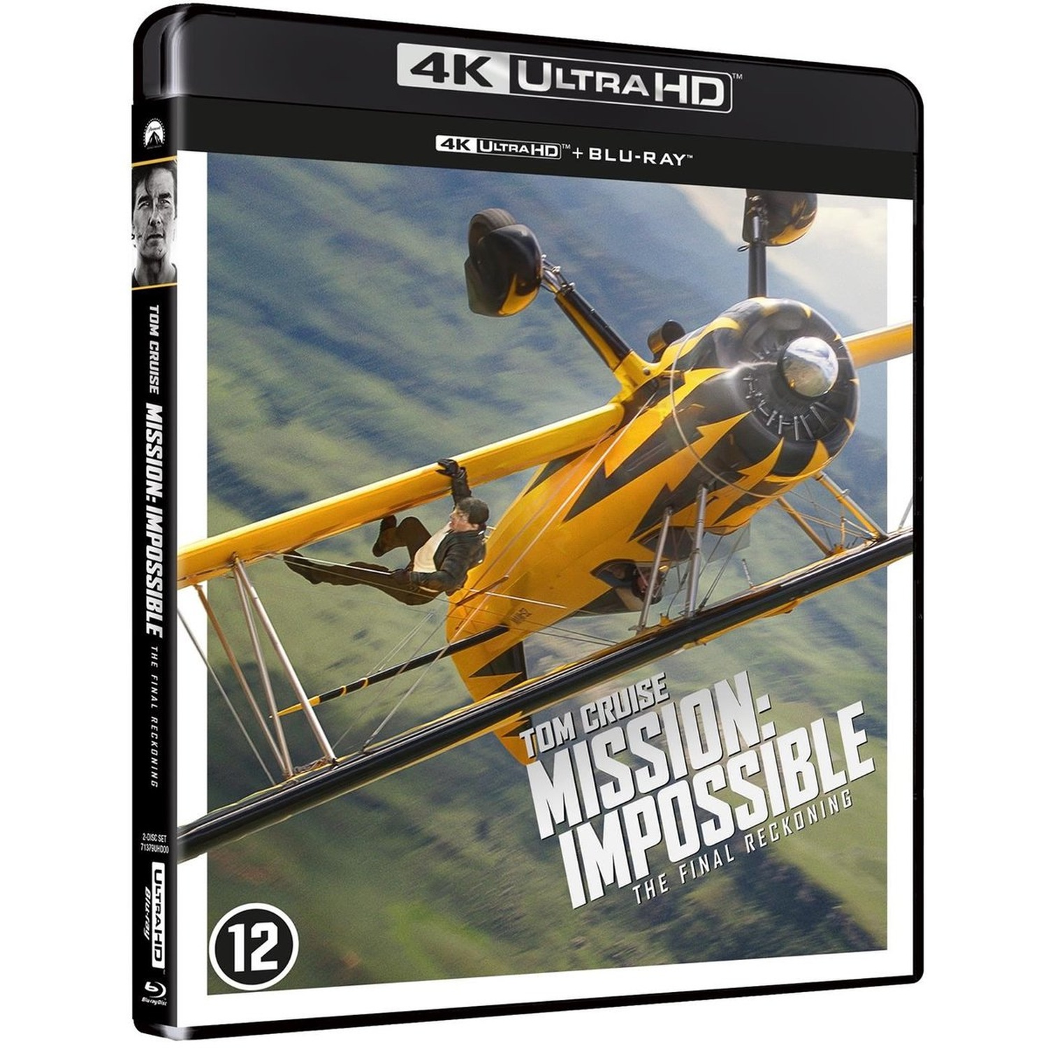 The cover of Mission: Impossible features Tom Cruise on a yellow biplane. The title is visible with a rating of 12.