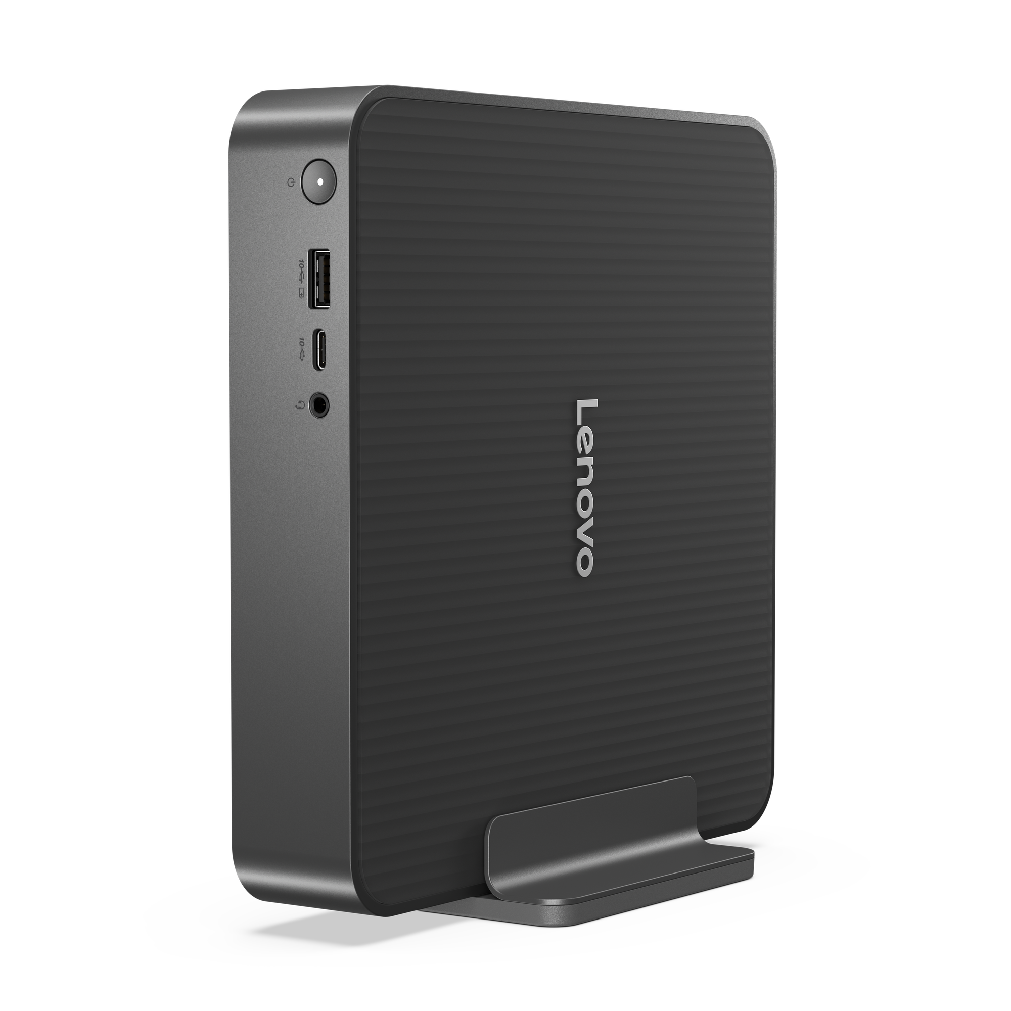 Un ordinateur Lenovo noir. Il a un bouton d'alimentation, des ports USB et audio. Il repose sur un petit support assorti.