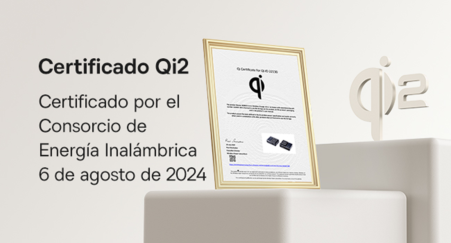 Un certificado Qi2 enmarcado. Texto en español. Se muestra el logotipo Qi2. El certificado está sobre un cubo blanco.