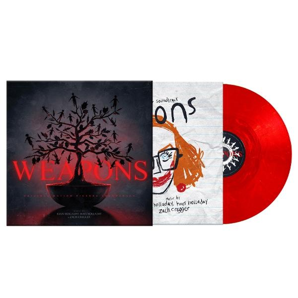 Albumcover und rote Schallplatte. Das Albumcover zeigt einen Baum mit Figuren. Das andere Cover hat einen Clown.
