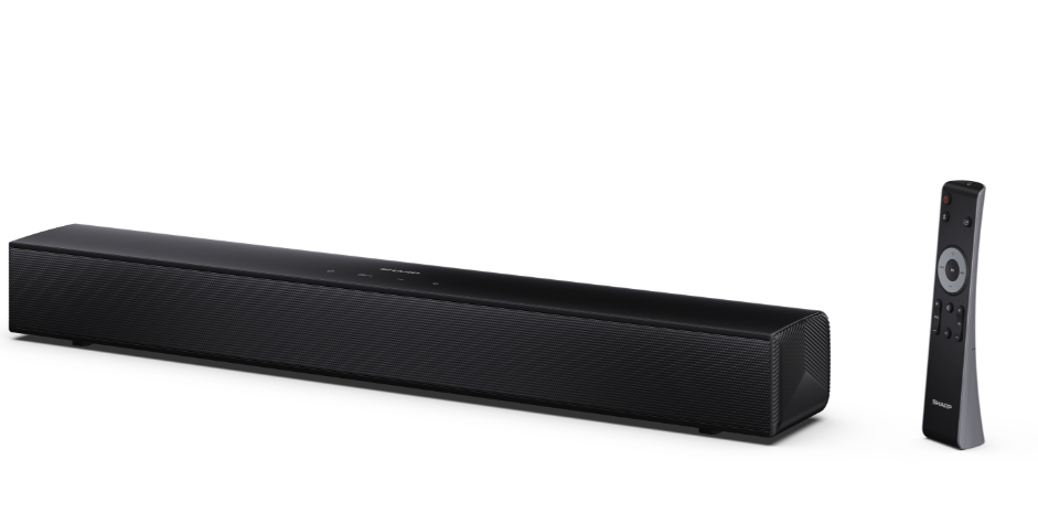 Czarny soundbar i pilot na białej powierzchni. Soundbar jest długi i prostokątny, pilot pionowy.