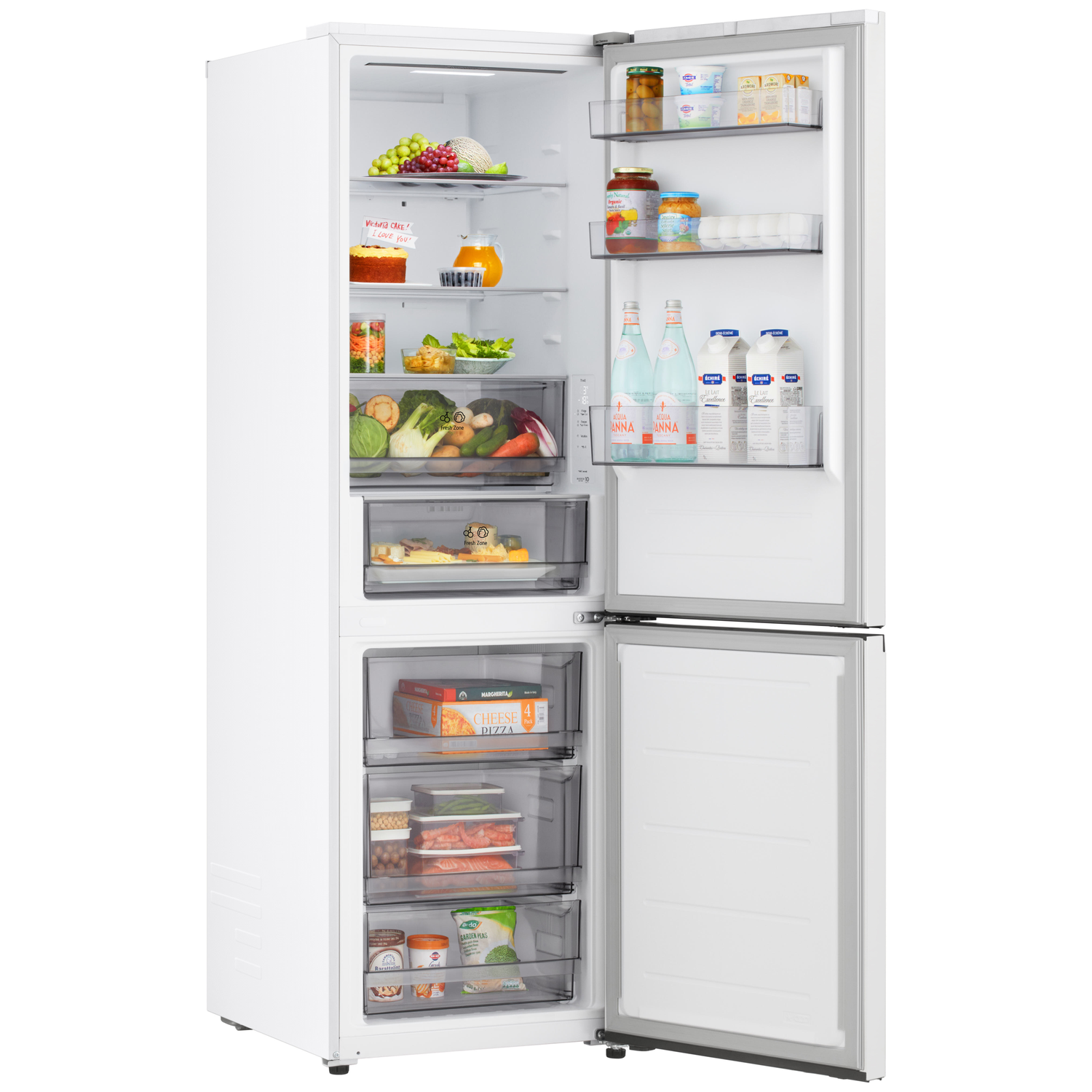 Open white refrigerator filled with food: fruits, vegetables, drinks, pizza, and other groceries. A note says 'Victoria CAKE! I LOVE YOU!'