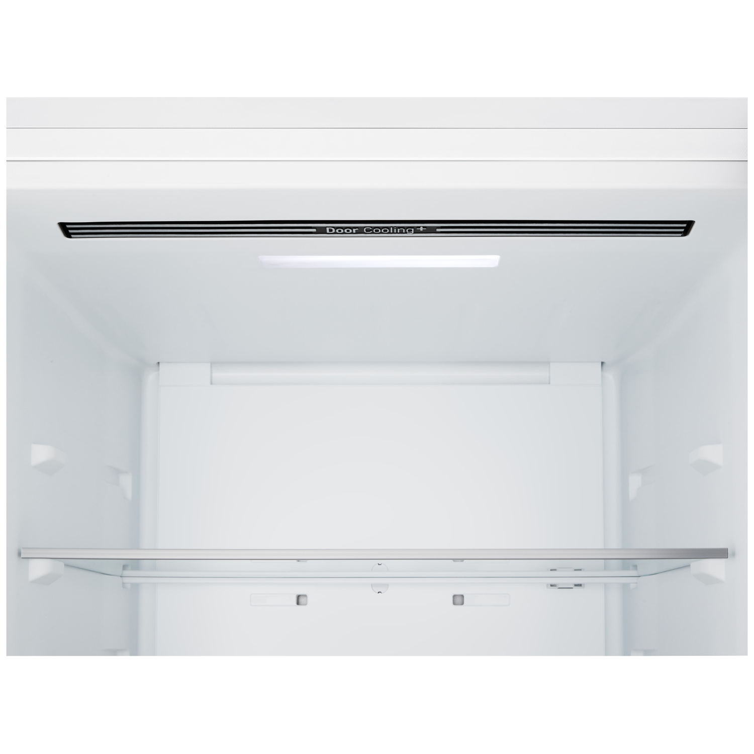 Inside of a white refrigerator. A glass shelf is visible at the bottom. The top has the words Door Cooling +.