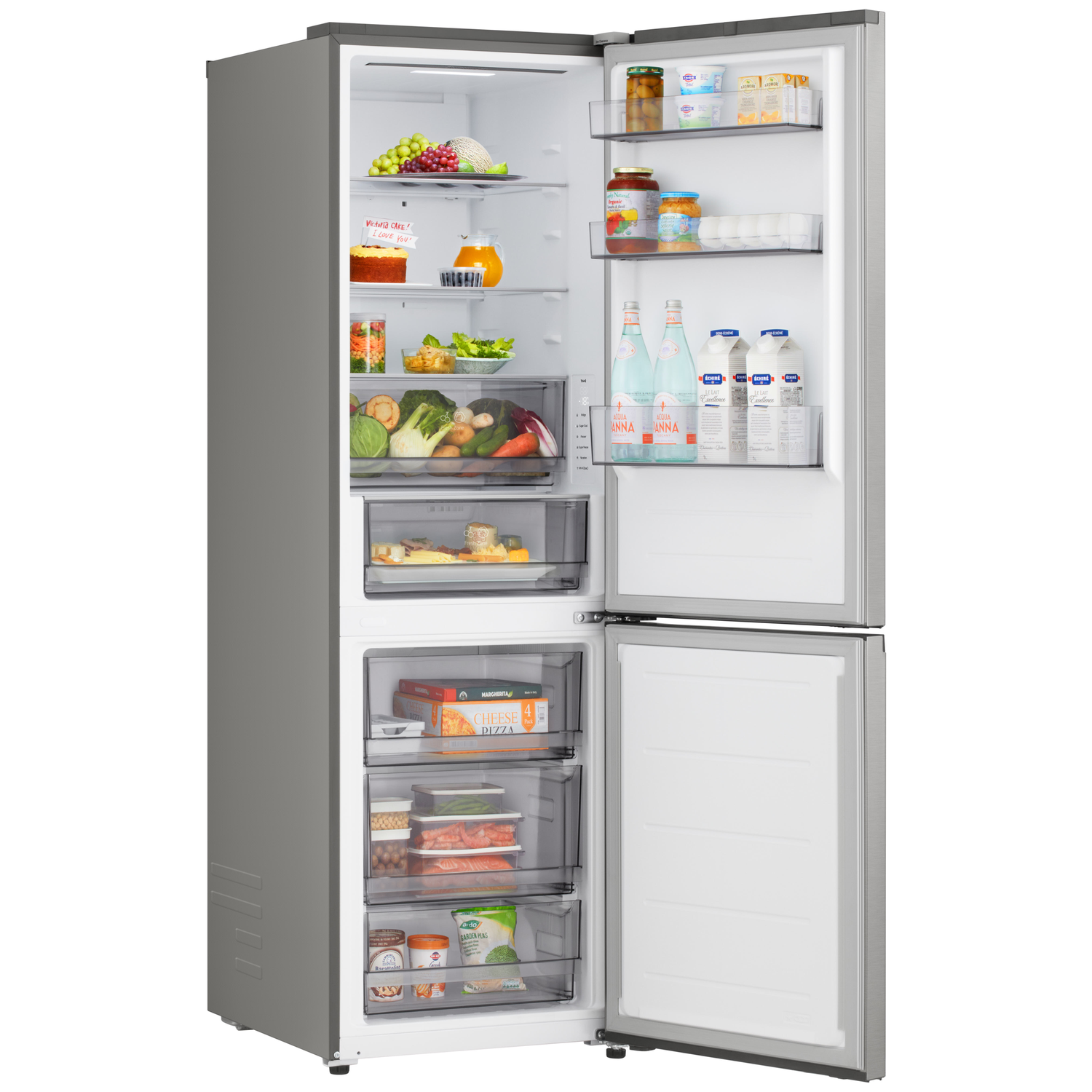 Open refrigerator filled with food: fruits, vegetables, drinks, and frozen pizzas. Various food items are visible on the shelves.
