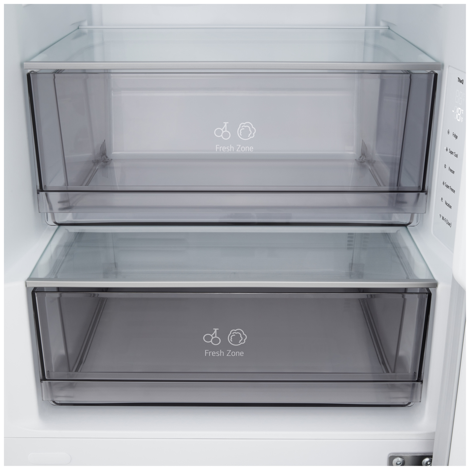 Inside a fridge. Two transparent drawers labeled 'Fresh Zone' are visible. The fridge has digital display and control buttons.
