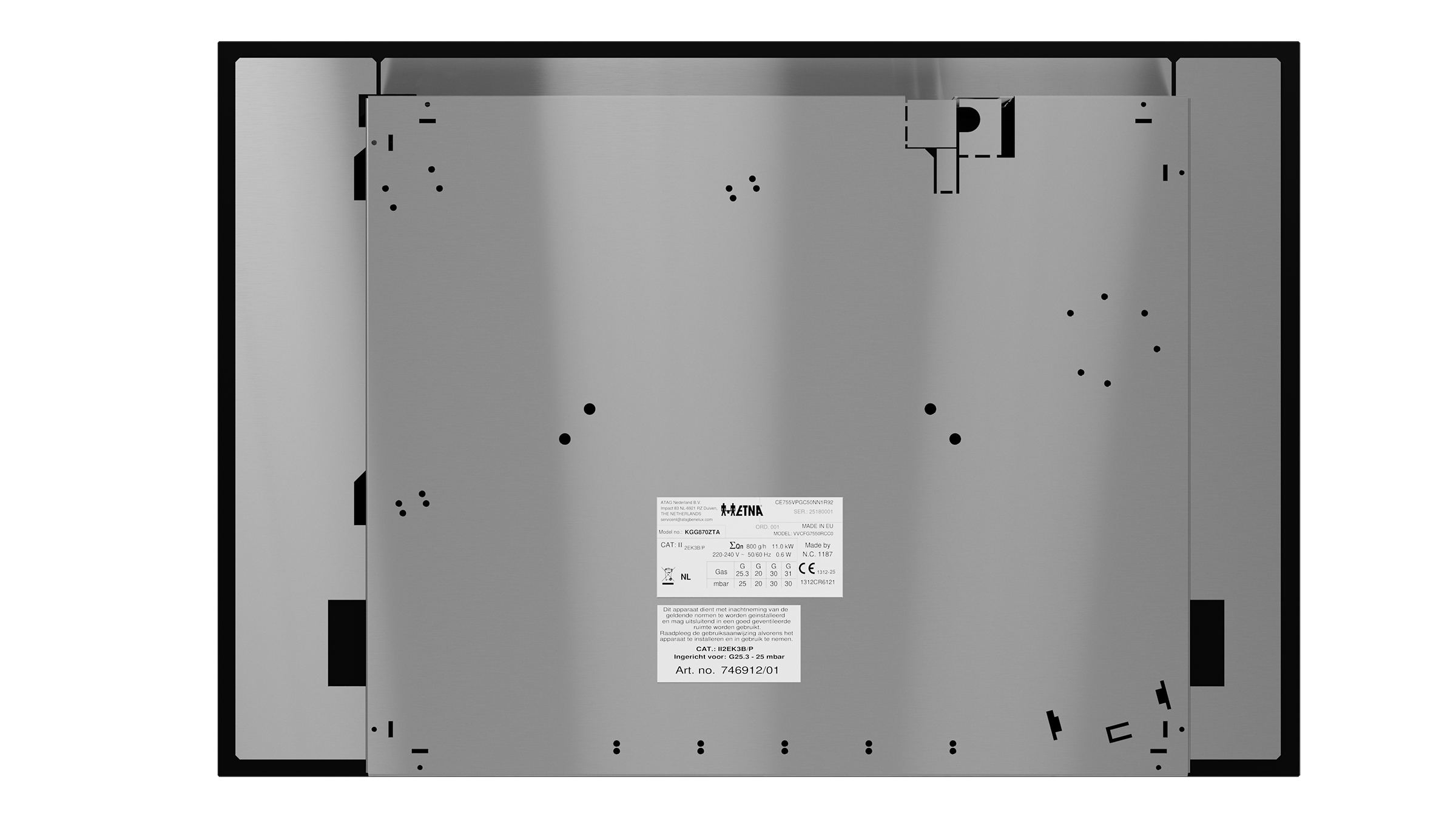 The underside of a black cooktop with a metal frame. There are technical details and a sticker with specifications.
