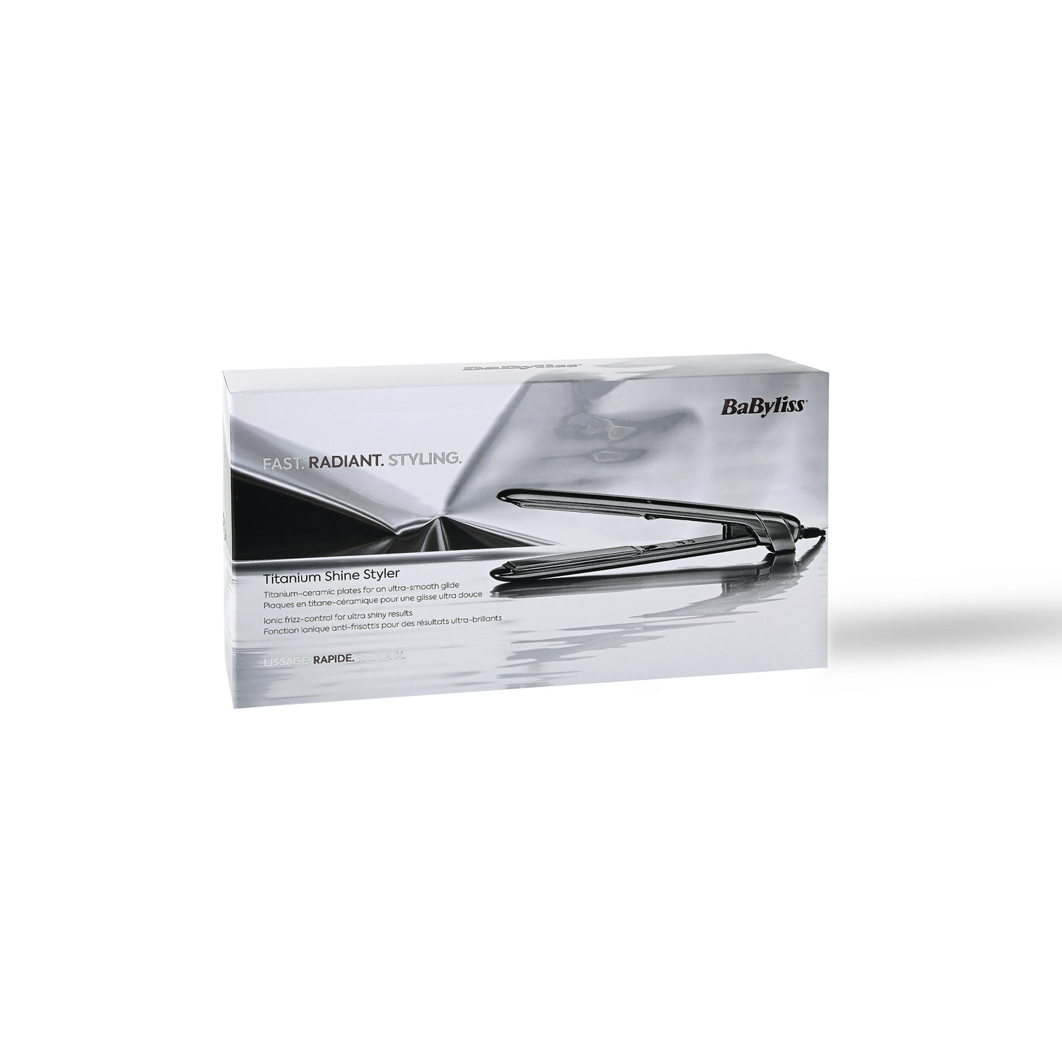 Una plancha de pelo Babyliss sobre fondo blanco, frente a su caja. La caja tiene el texto: Titanium Shine Styler.