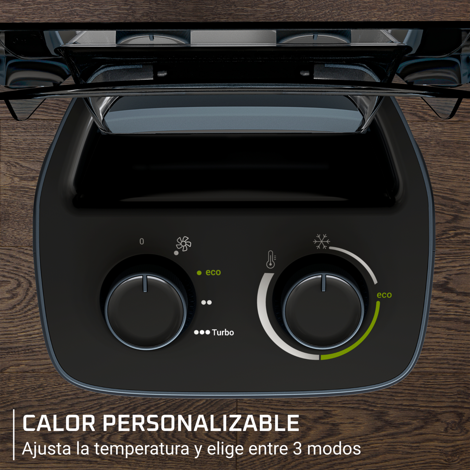 Primer plano de un panel de control negro con dos diales, con las etiquetas eco y turbo, sobre una superficie de madera.