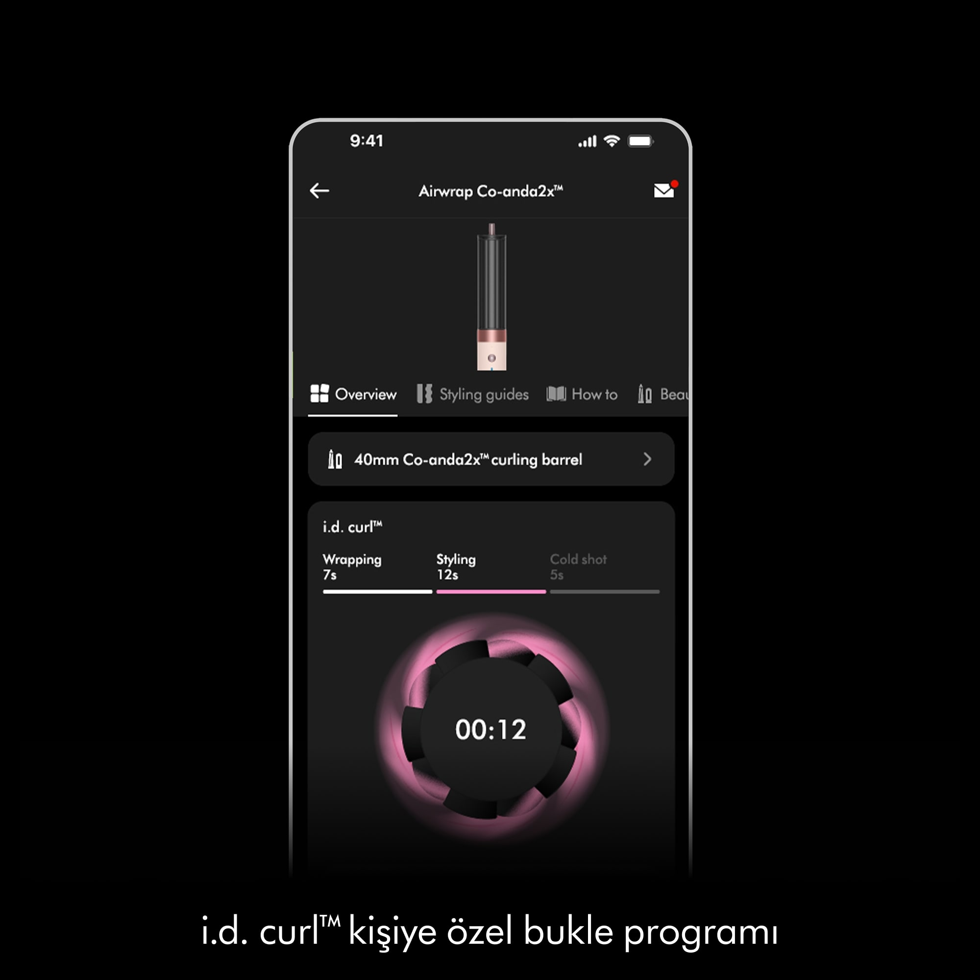 Telefon ekranı bir saç şekillendirme uygulaması gösteriyor. 12 saniyeye ayarlanmış bir zamanlayıcı görüntüler.