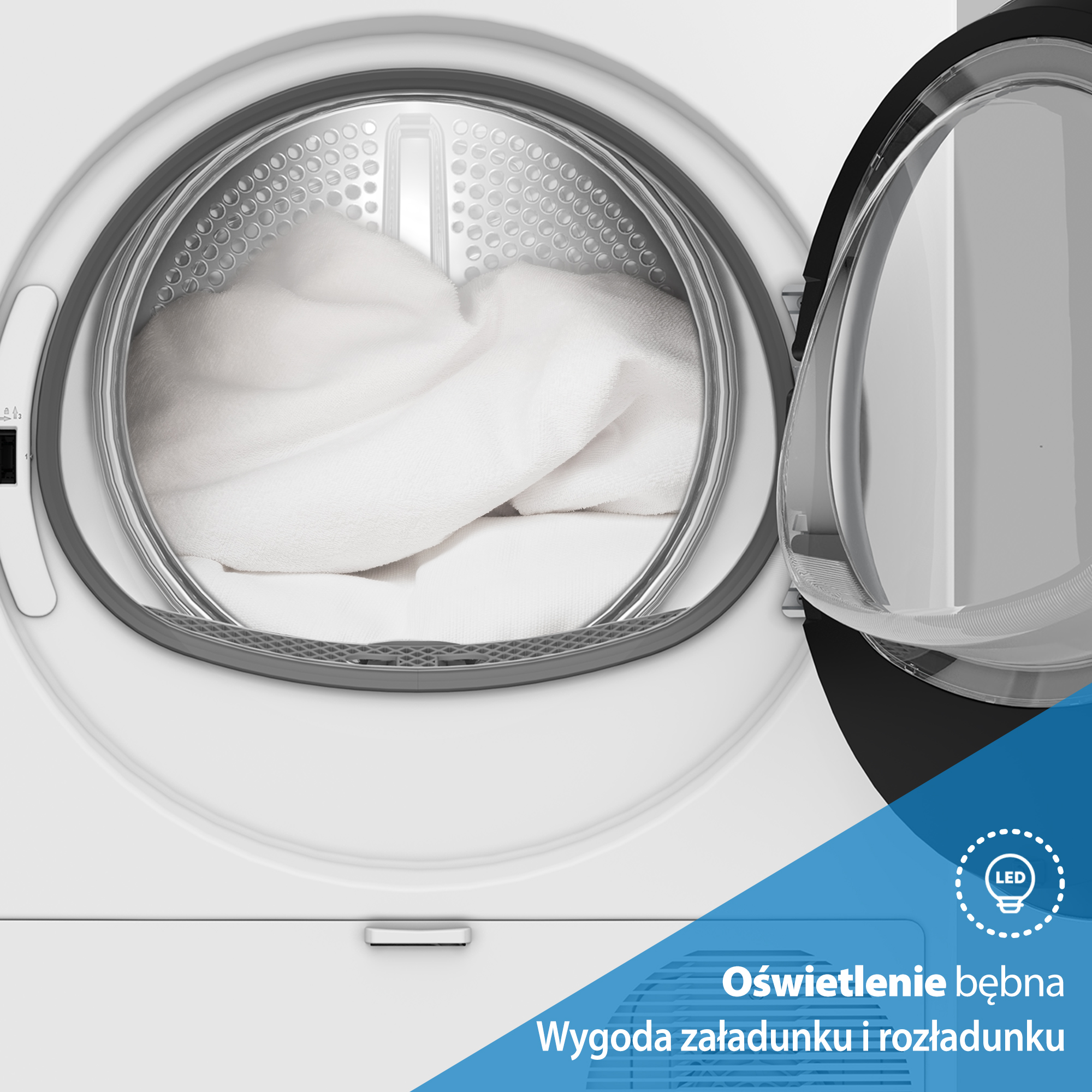 Otwarta suszarka z białymi ręcznikami w środku. Drzwi są otwarte, widać wnętrze. Widoczne światło LED i tekst.